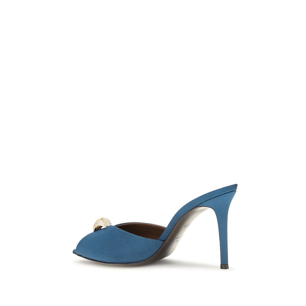 Indulge in the elegance of Giuseppe Zanotti's Blue Calf Leather Bos Taurus Stiletto Heel Sandals, where refined craftsmanship meets bold sophistication for unforgettable evenings.