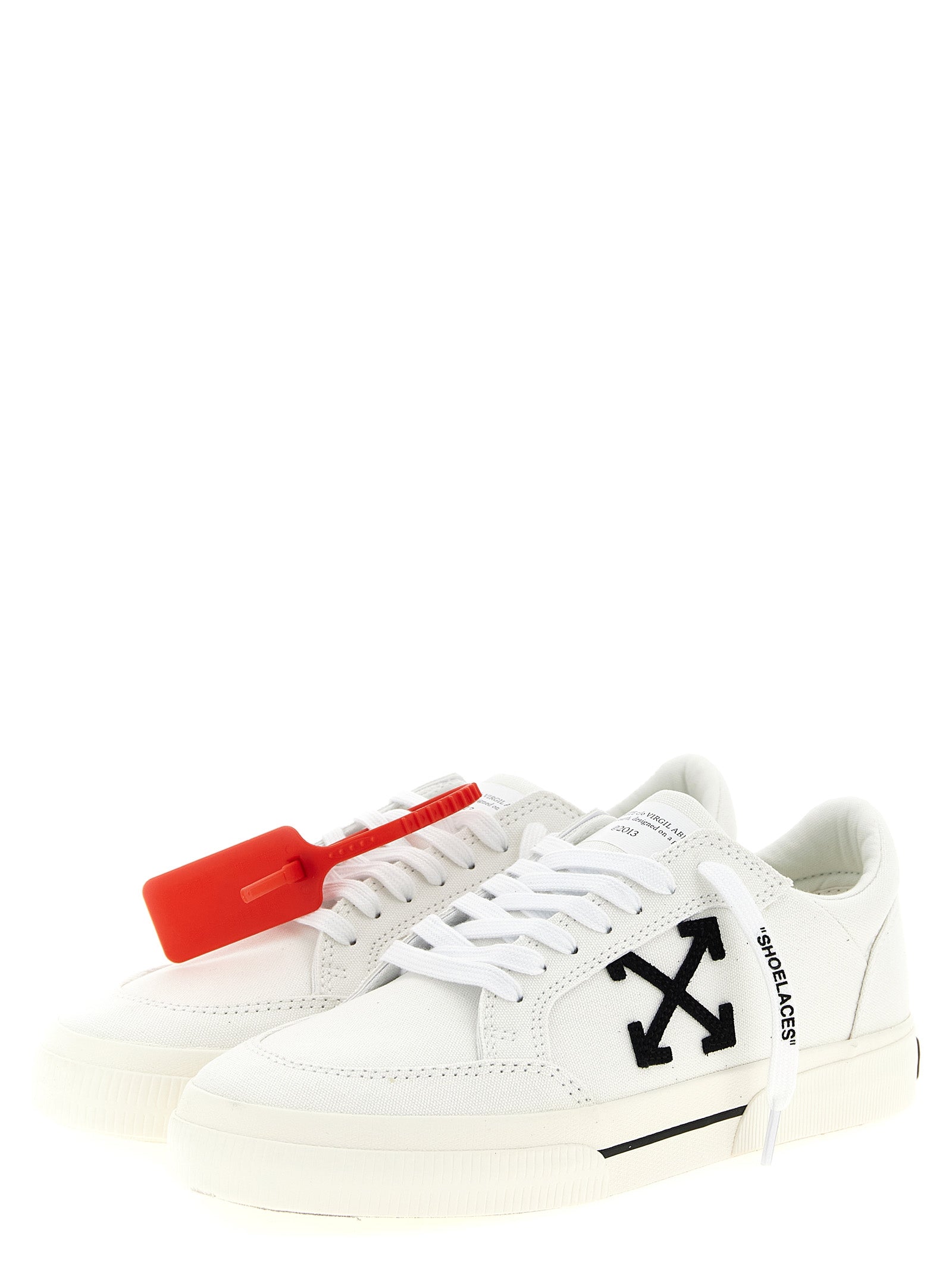 Step into elegance with Off-White's Bicolor Cotton Low Top Sneakers, where bold design meets exquisite craftsmanship for a statement of luxury and style.