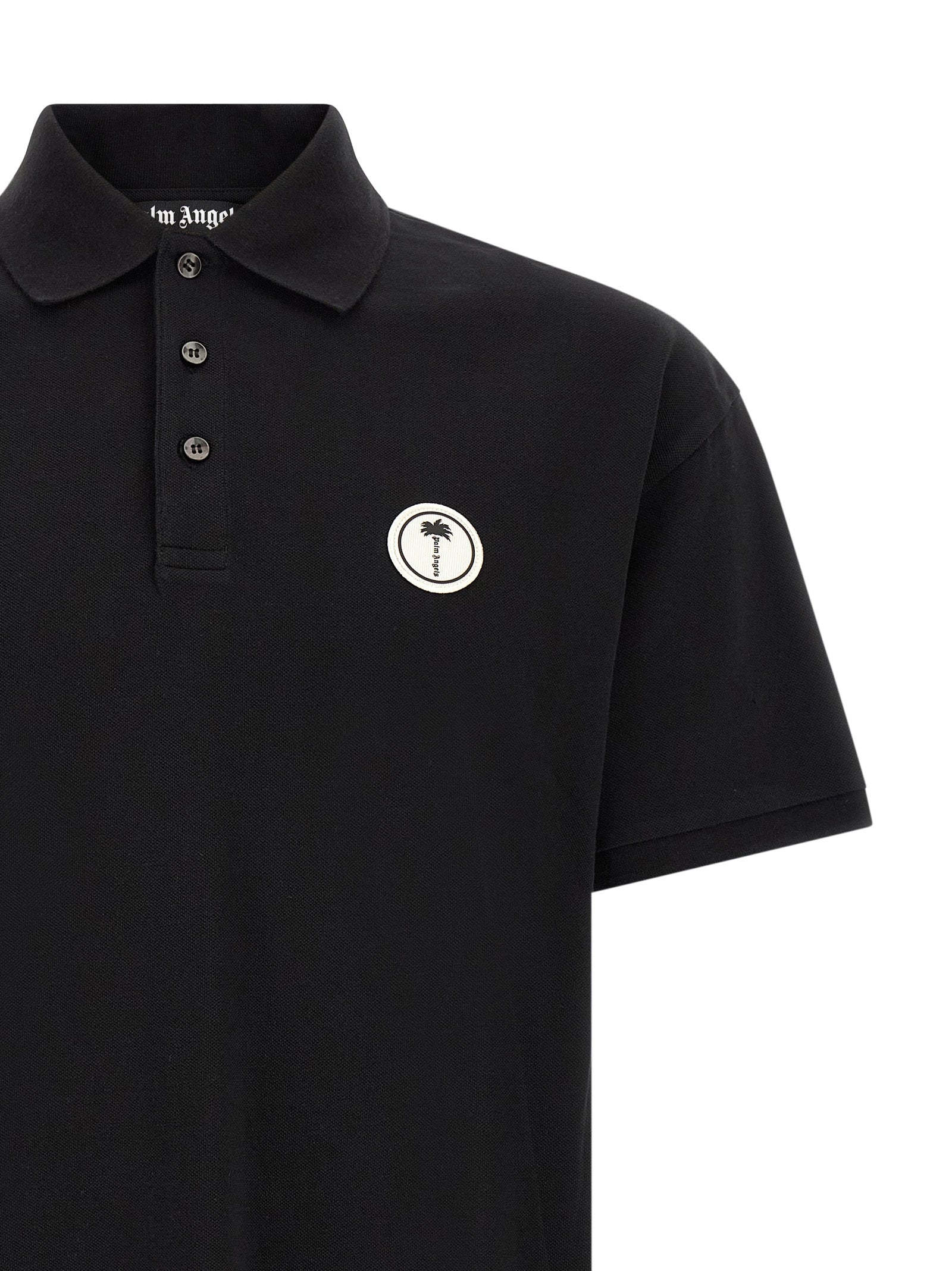 Discover the Palm Angels Black Cotton Polo Shirt, a fusion of modern elegance and timeless style, crafted from luxurious black cotton piquet for the discerning wardrobe.