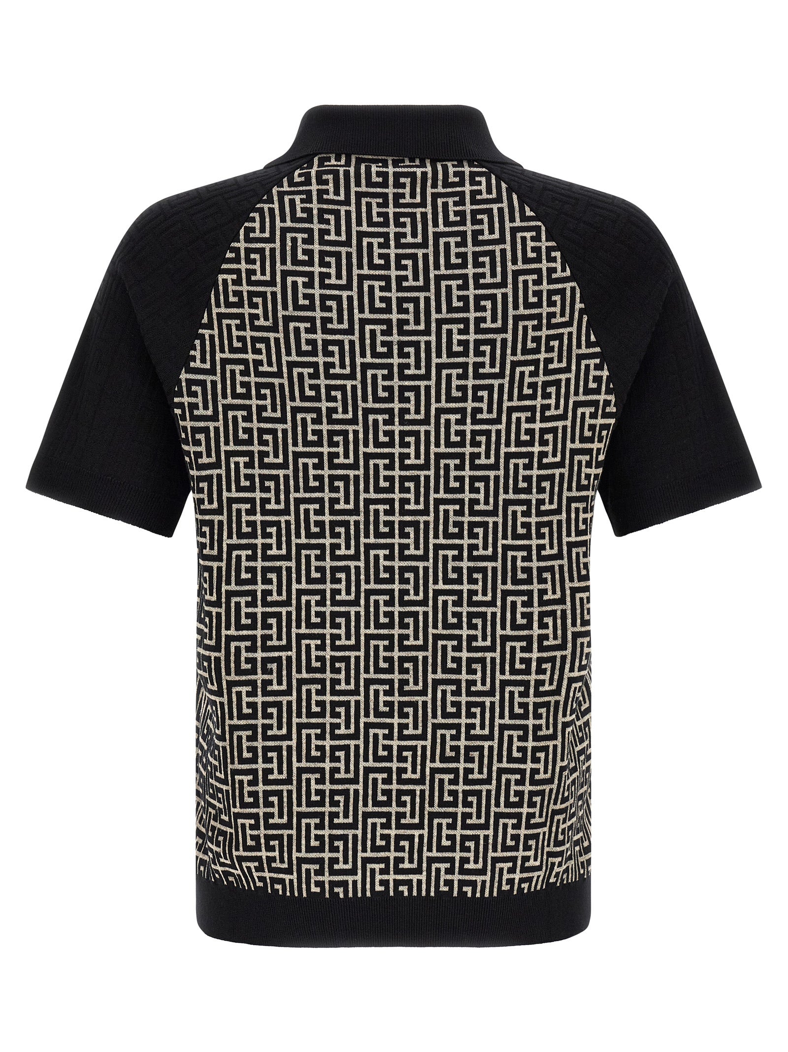 Elevate your wardrobe with the Balmain Bicolor Cotton Polo Shirt, a luxurious blend of cotton and linen, embodying sophistication and timeless elegance for discerning tastes.
