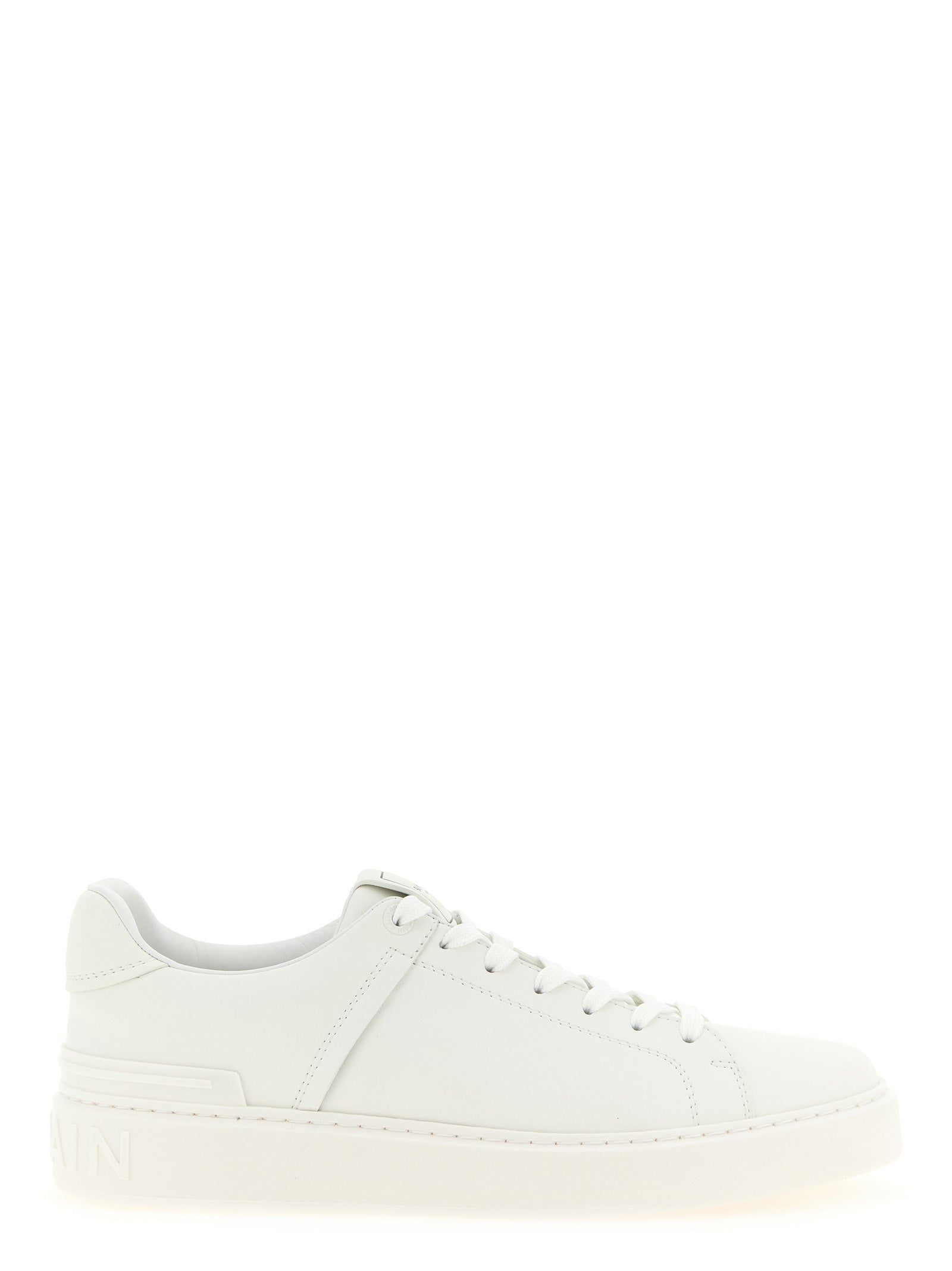 Elevate your style with Balmain's White Calfskin Low Top Sneakers, a testament to exquisite craftsmanship and timeless elegance, perfect for the modern connoisseur.