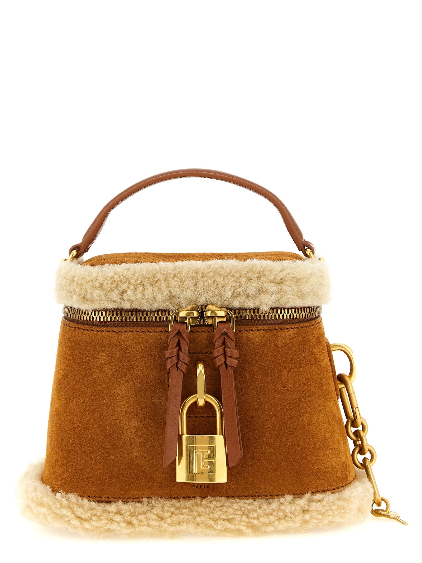 Indulge in the elegance of BALMAIN’s Pulse Vanity handbag, a masterpiece of Italian craftsmanship in rich brown suede and plush sheepskin, defining modern luxury.