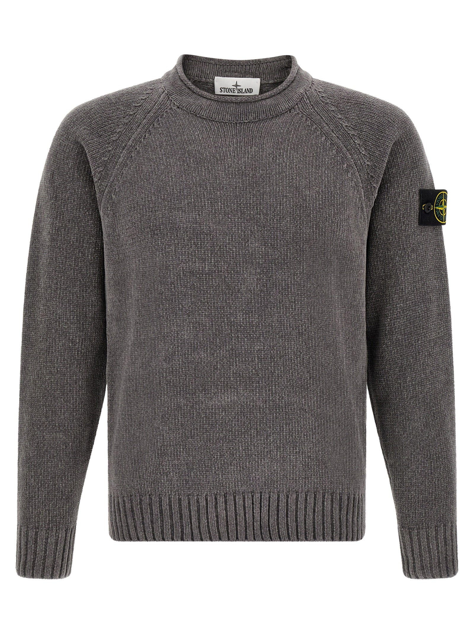 Elevate your wardrobe with the Stone Island Gray Cotton Cardigan, a masterpiece of contemporary knitwear crafted from fine mouliné cotton chenille, embodying luxury and sophistication.