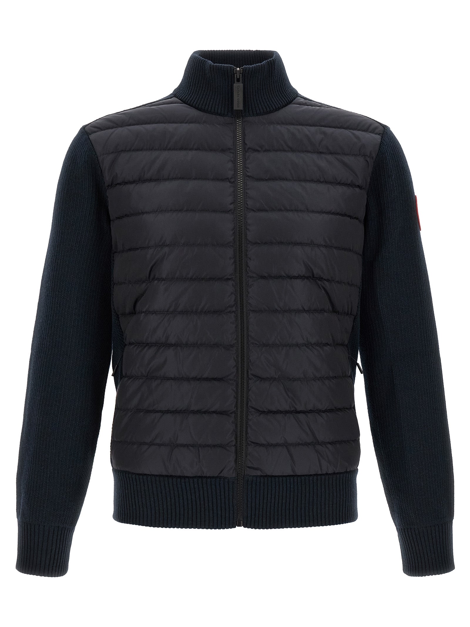 Discover the Canada Goose Black Wool Full-Length Jacket, a masterful blend of technical innovation and luxurious comfort, perfect for the discerning individual.