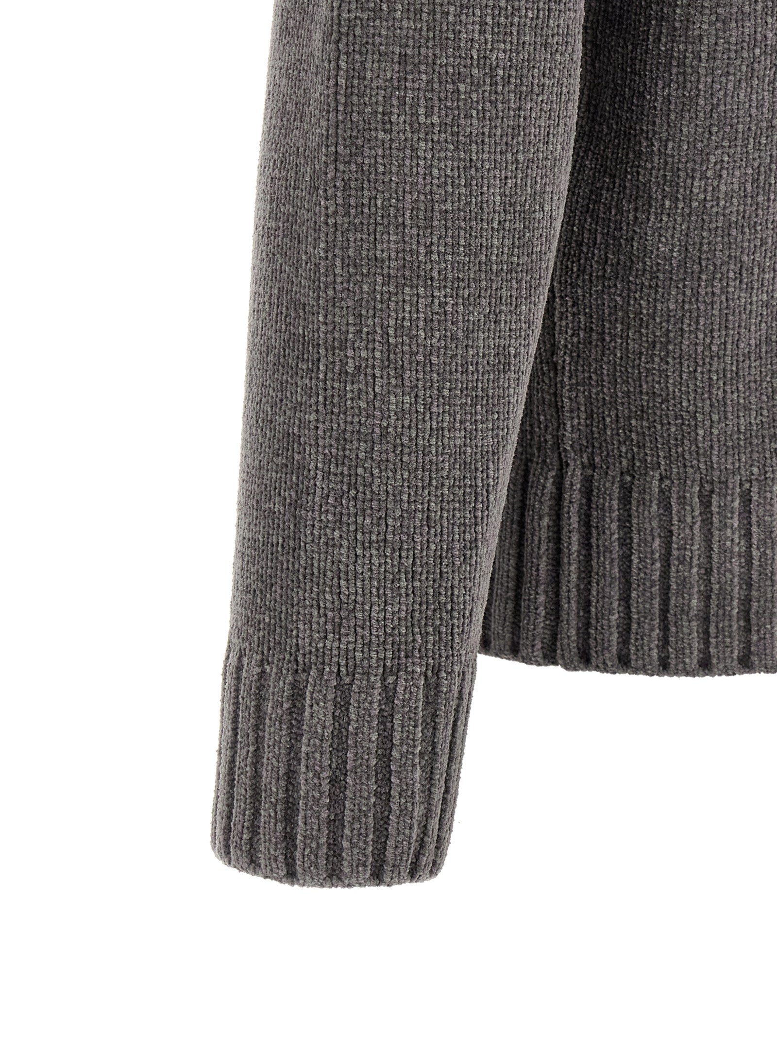 Elevate your wardrobe with the Stone Island Gray Cotton Cardigan, a masterpiece of contemporary knitwear crafted from fine mouliné cotton chenille, embodying luxury and sophistication.