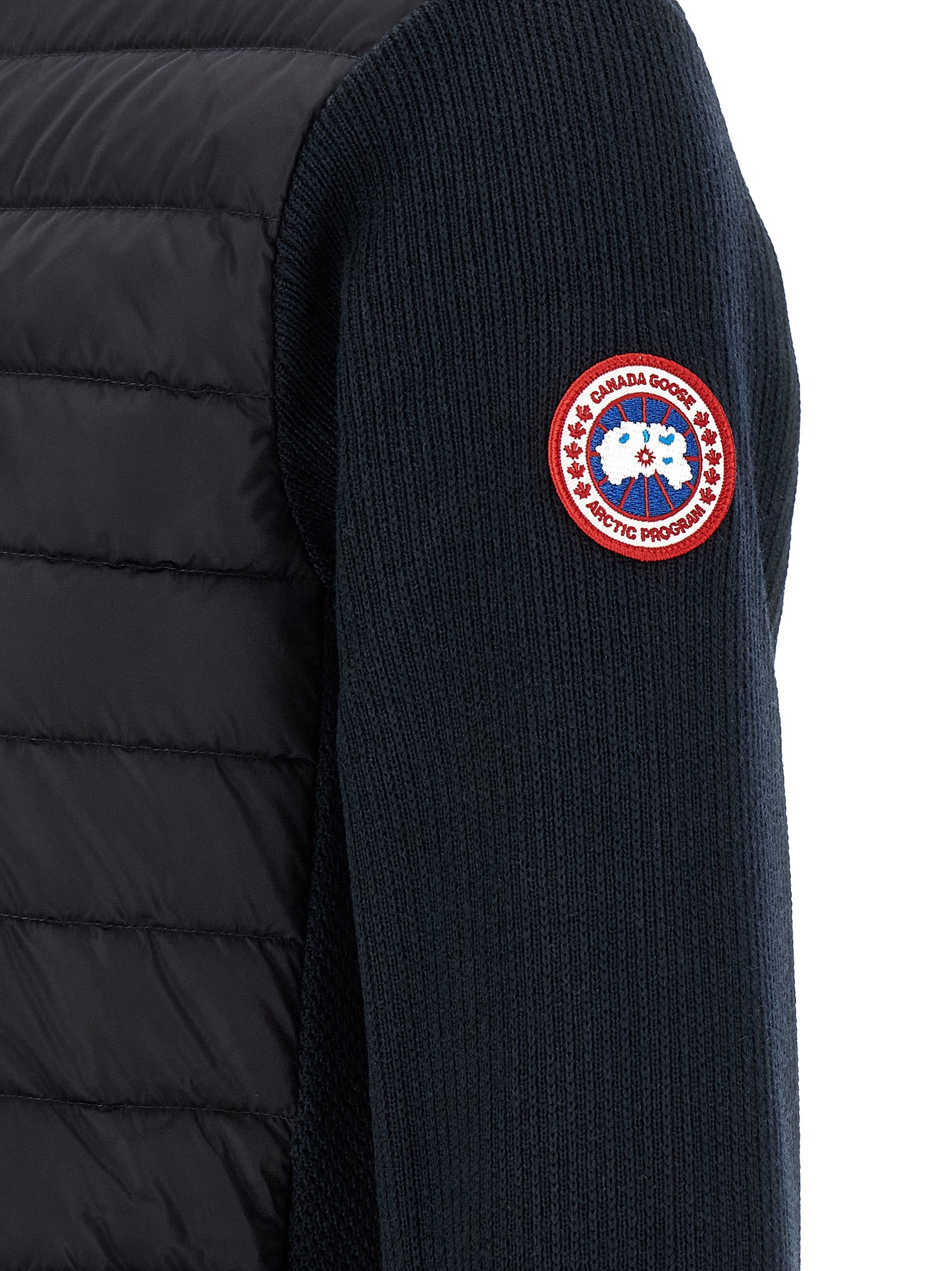 Experience the exquisite craftsmanship of the Canada Goose Black Wool Full-Length Jacket, where luxurious materials meet sophisticated design for an elevated lifestyle.