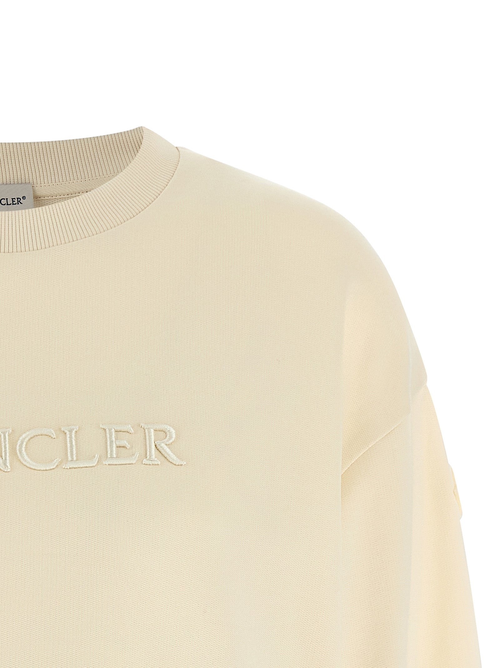 Elevate your wardrobe with the Moncler Beige Cotton Sweatshirt, a luxurious blend of comfort and style, featuring exquisite craftsmanship and subtle logo detailing for an effortlessly chic look.