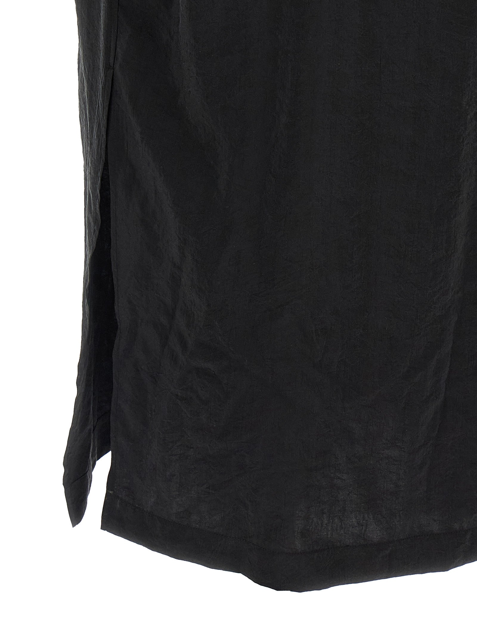 Elevate your wardrobe with the LEMAIRE Black Silk Midi Dress, a masterpiece of luxury-textured silk that embodies daring sophistication and timeless elegance.