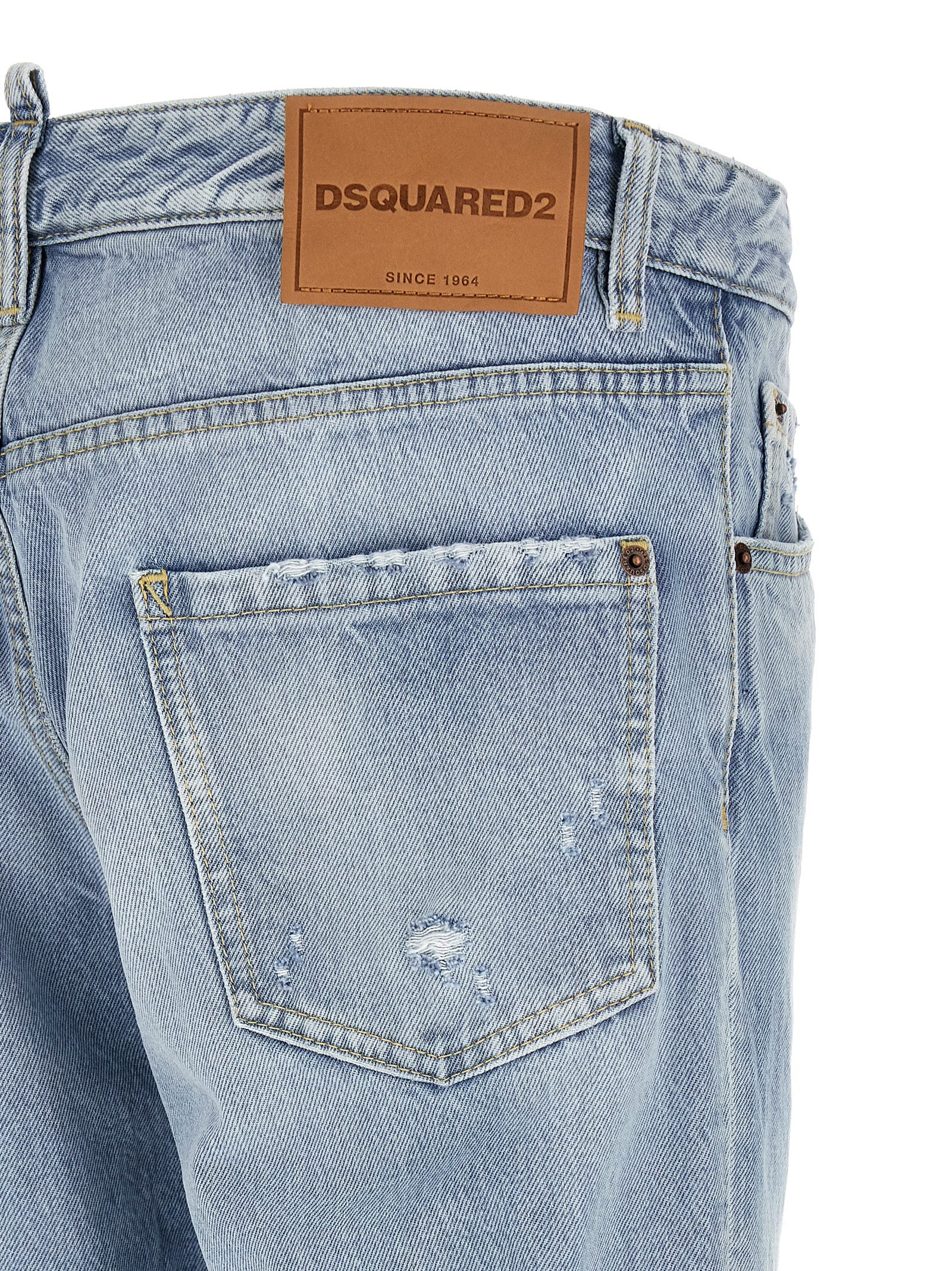 Elevate your wardrobe with DSQUARED2's Teddy denim jeans, crafted from 100% cotton for a chic, worn-in allure that embodies timeless luxury and modern sophistication.