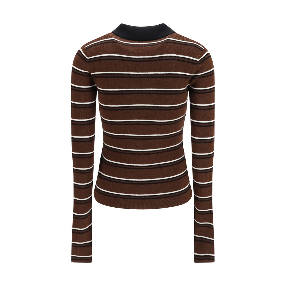 Indulge in the exquisite elegance of the Ganni Brown Wool Oves Aries Dress Shirt, crafted from luxurious merino wool, embodying refined sophistication for the discerning individual.