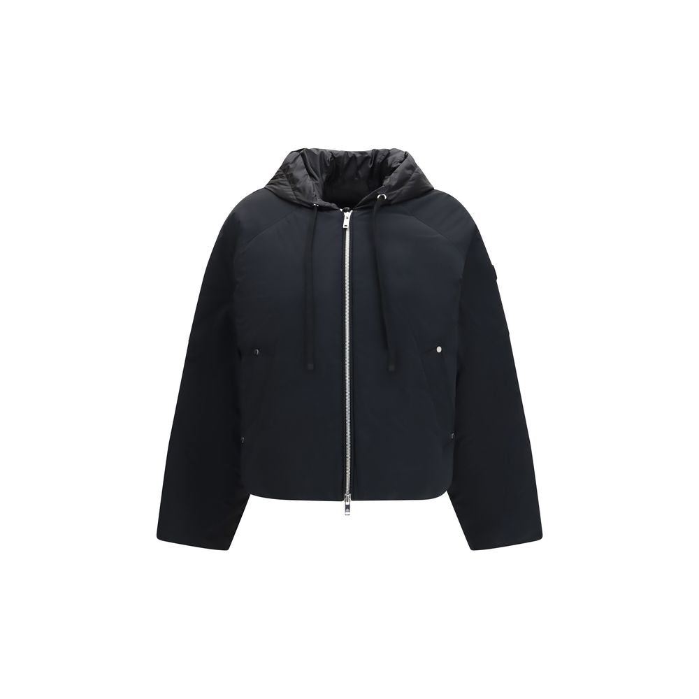 Indulge in the Tegan Bomber Down Jacket by Moose Knuckles, crafted from recycled ripstop nylon, embodying luxury and sustainability for the discerning individual.