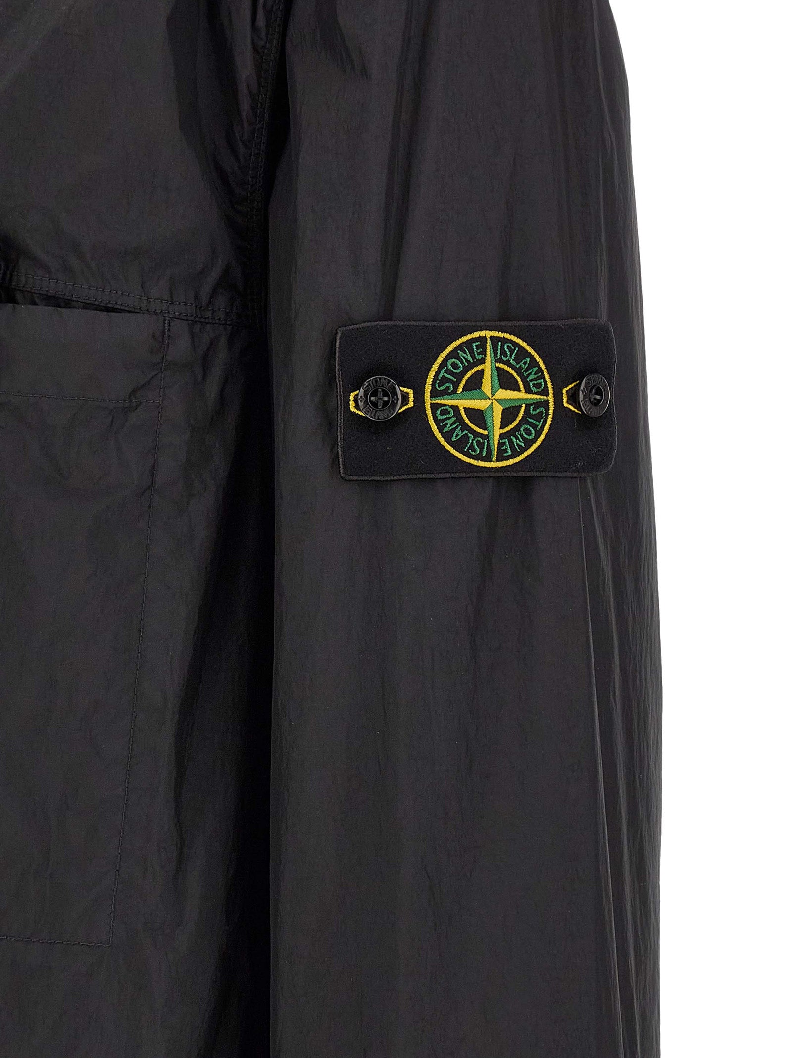 Discover the Stone Island Black Polyamide Shell Jacket, a masterclass in luxury and style, crafted for those who appreciate refined elegance and sustainable sophistication.