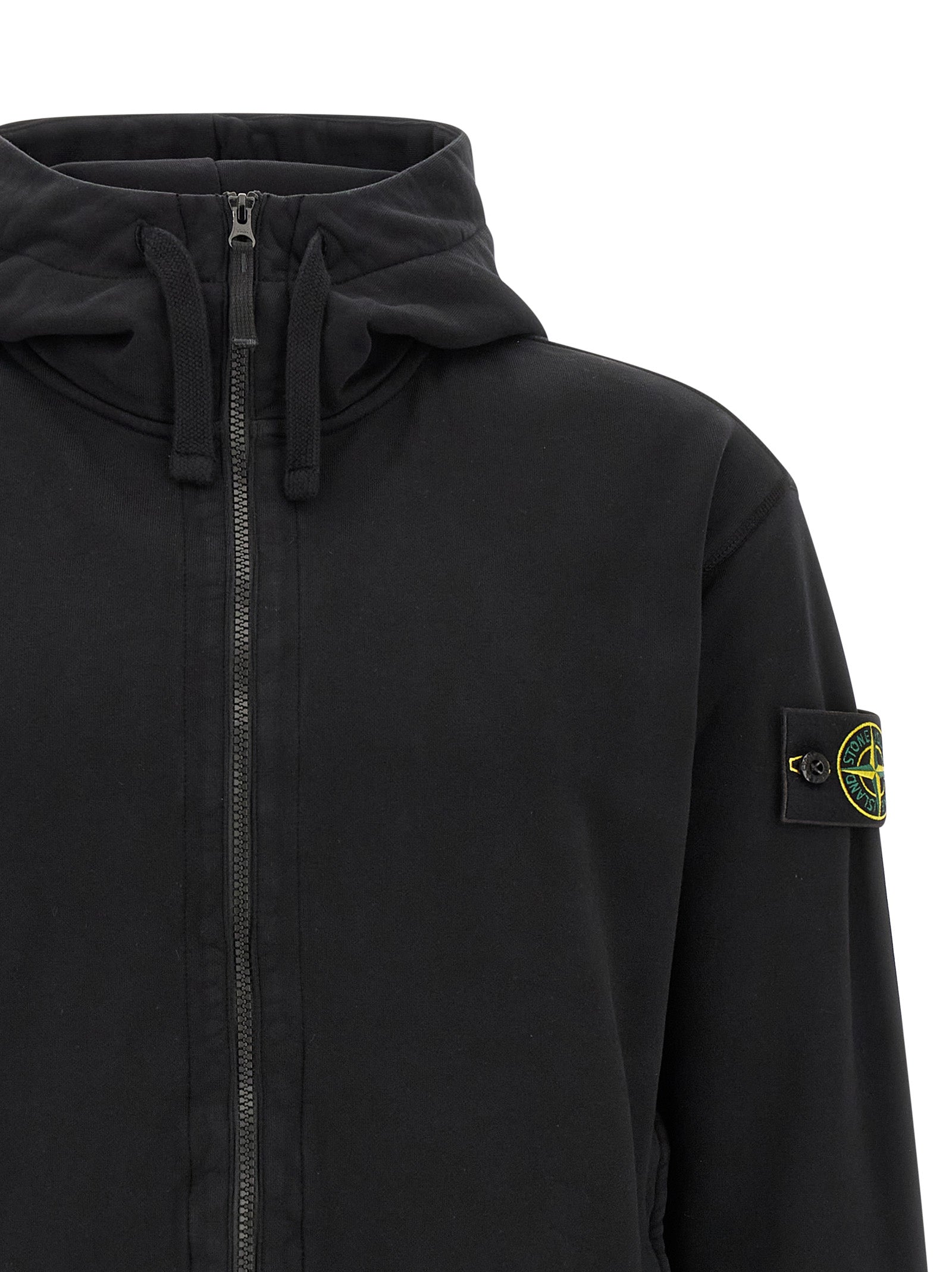 Discover the Stone Island Black Cotton Sweatshirt, a fusion of organic luxury and innovative design, perfect for those who embrace comfort and style with sophistication.
