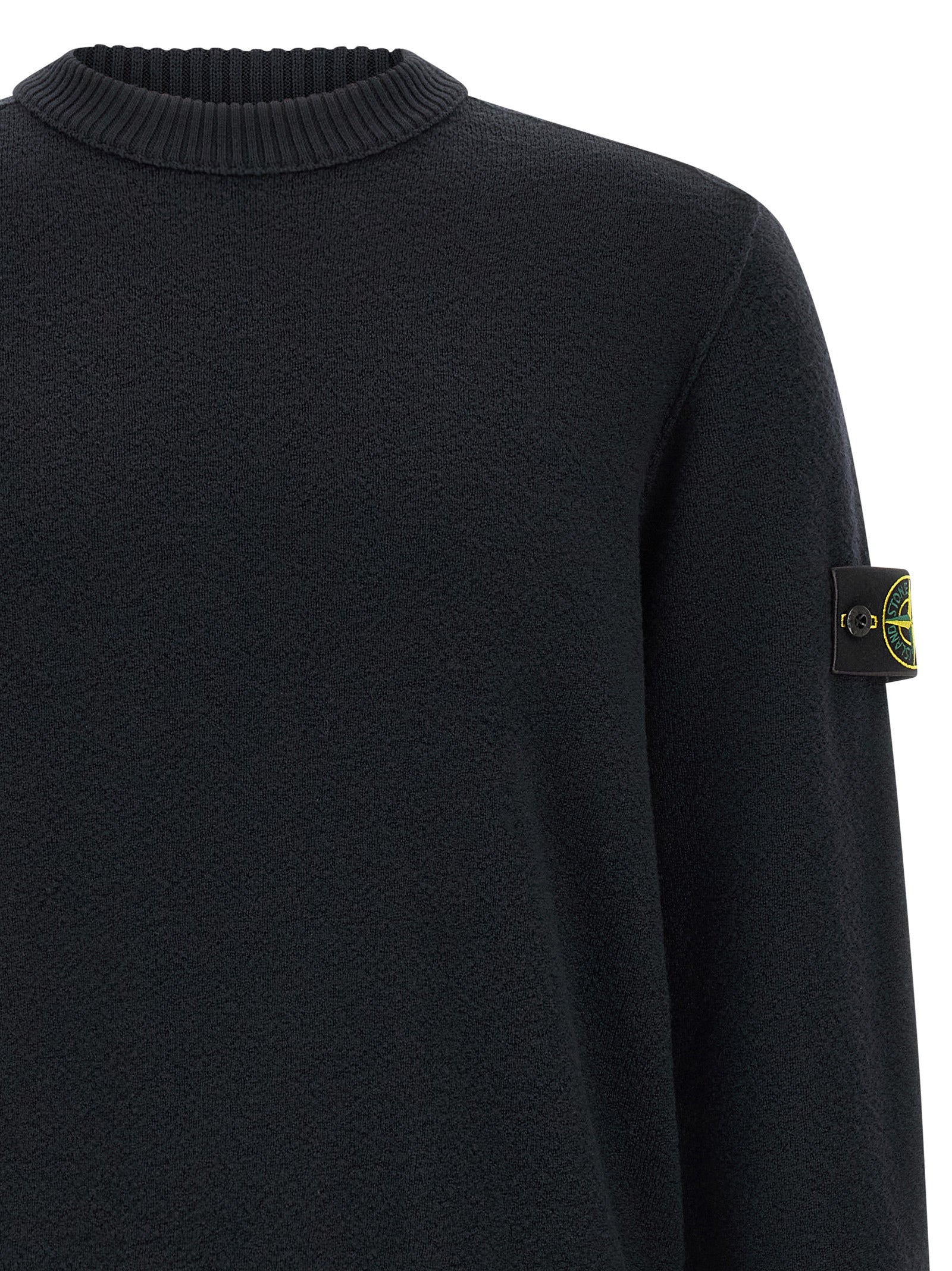 Discover the Stone Island Blue Virgin Wool Cardigan, a masterpiece of craftsmanship and style, perfect for those who appreciate refined luxury and timeless elegance.