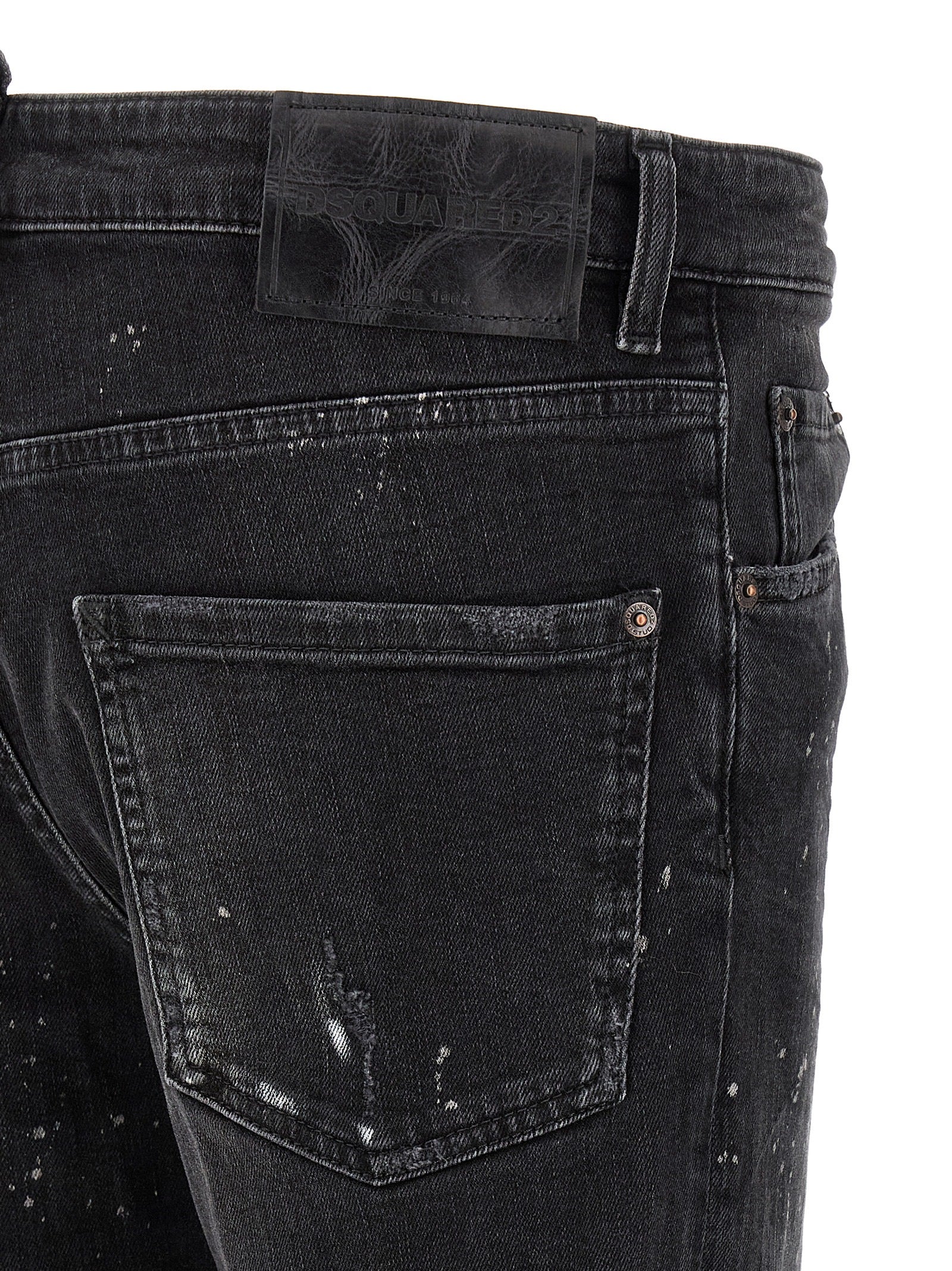 Elevate your wardrobe with Dsquared² Black Cotton Slim Fit Jeans, where urban chic meets exquisite craftsmanship, perfect for those who embrace bold elegance.