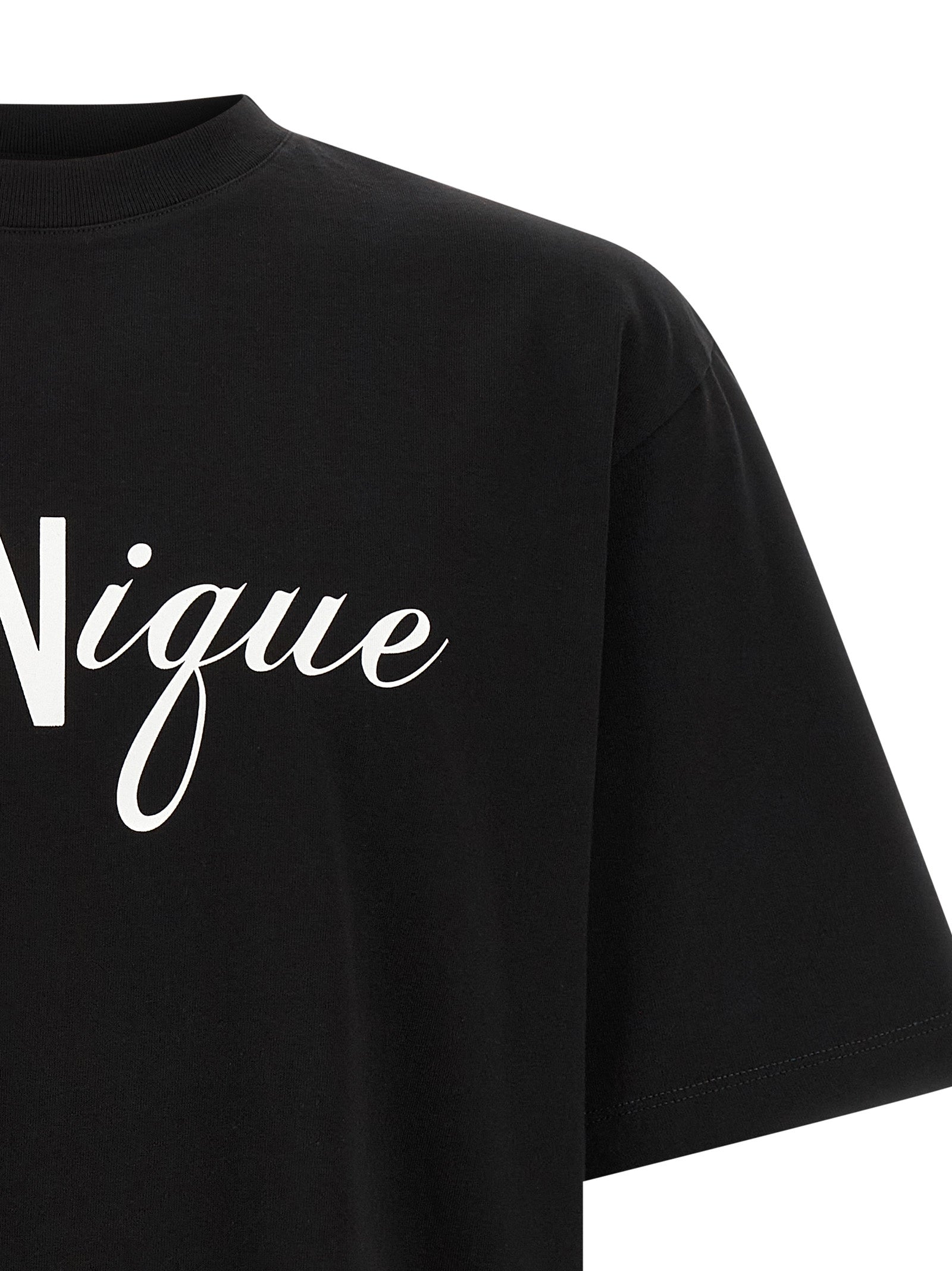 Indulge in the luxurious allure of DSQUARED2's Black Cotton T-Shirt, crafted in Italy from premium cotton, featuring striking prints that elevate your style with effortless sophistication.