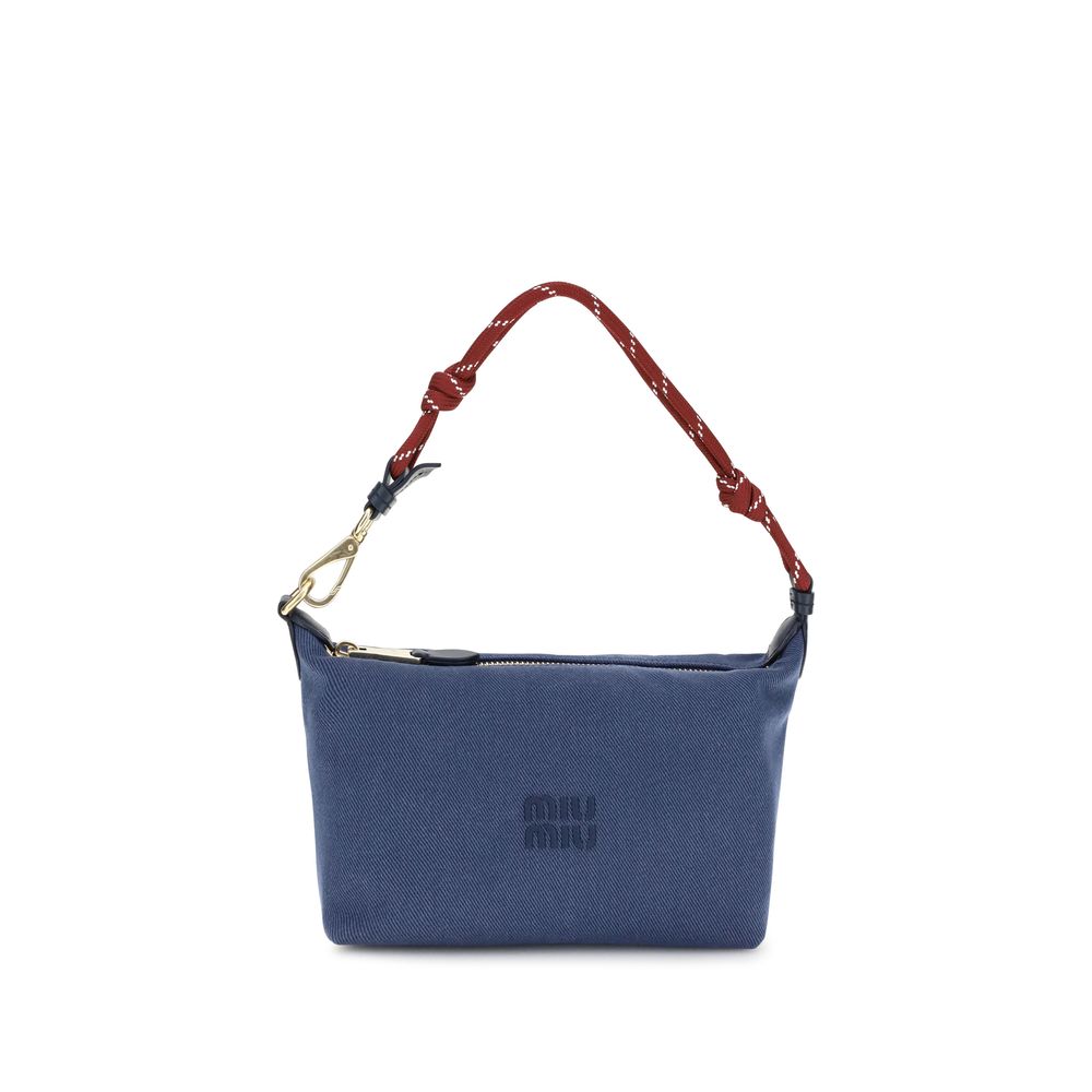 Discover the Miu Miu Blue Cotton Shoulder Bag, a blend of elegance and functionality, crafted from 100% cotton with iconic monogram detailing for a luxurious statement.
