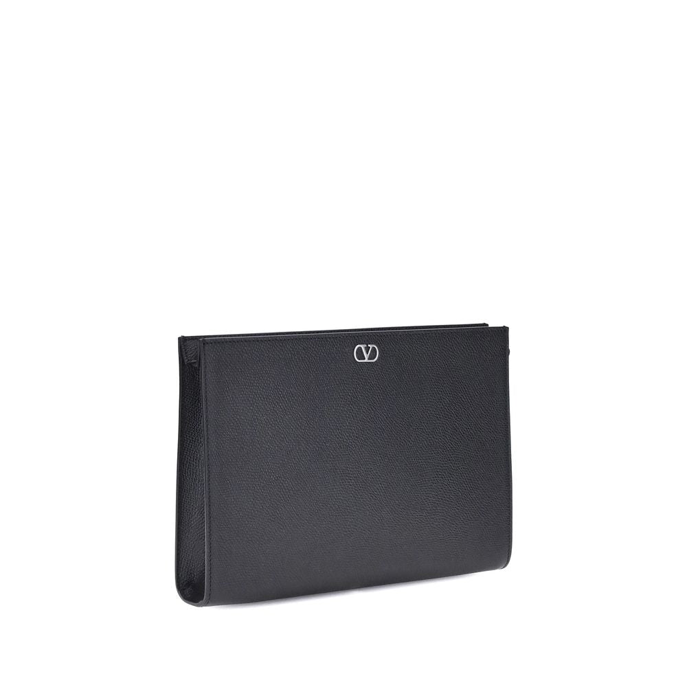 Indulge in the elegance of the Valentino Garavani Black Calf Leather Bos Taurus Wallet, a masterpiece of refined craftsmanship, designed for those who embody luxury and sophistication.