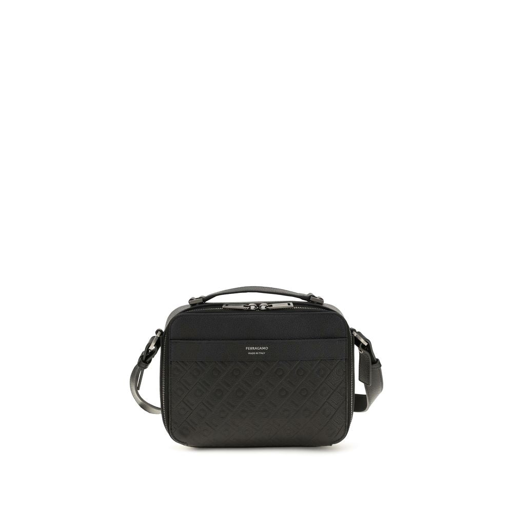 Indulge in the timeless elegance of the Ferragamo Black Calf Leather Bos Taurus Shoulder Bag, a masterpiece of grained leather and refined design, perfect for the discerning individual.