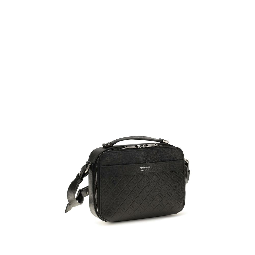 Discover the Ferragamo Black Calf Leather Bos Taurus Shoulder Bag, a masterpiece of grained leather and embossed elegance, perfect for those who embody timeless luxury.