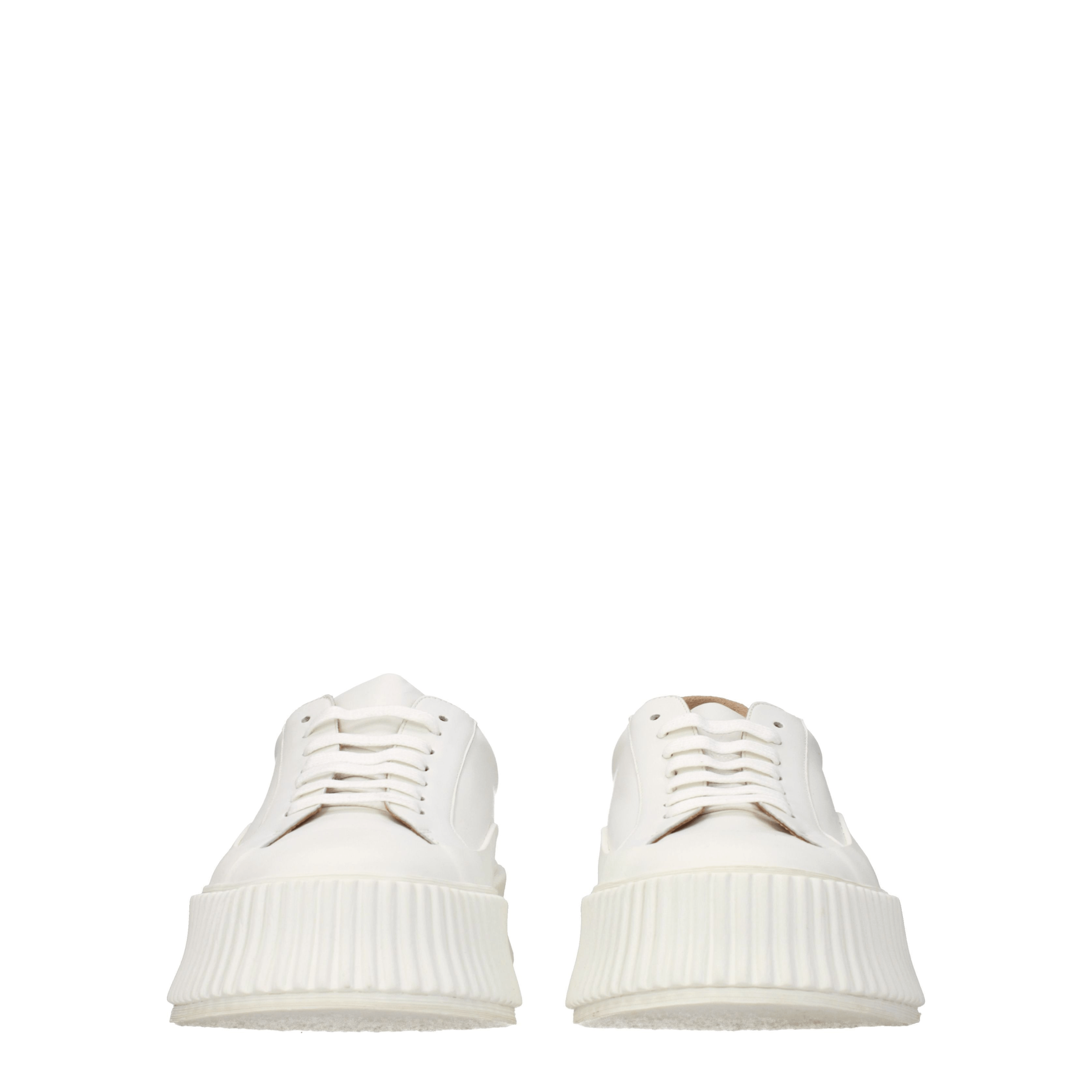 Elevate your style with Jil Sander's White Leather Platform Sneakers, a seamless blend of exquisite craftsmanship and contemporary elegance, perfect for the discerning individual.