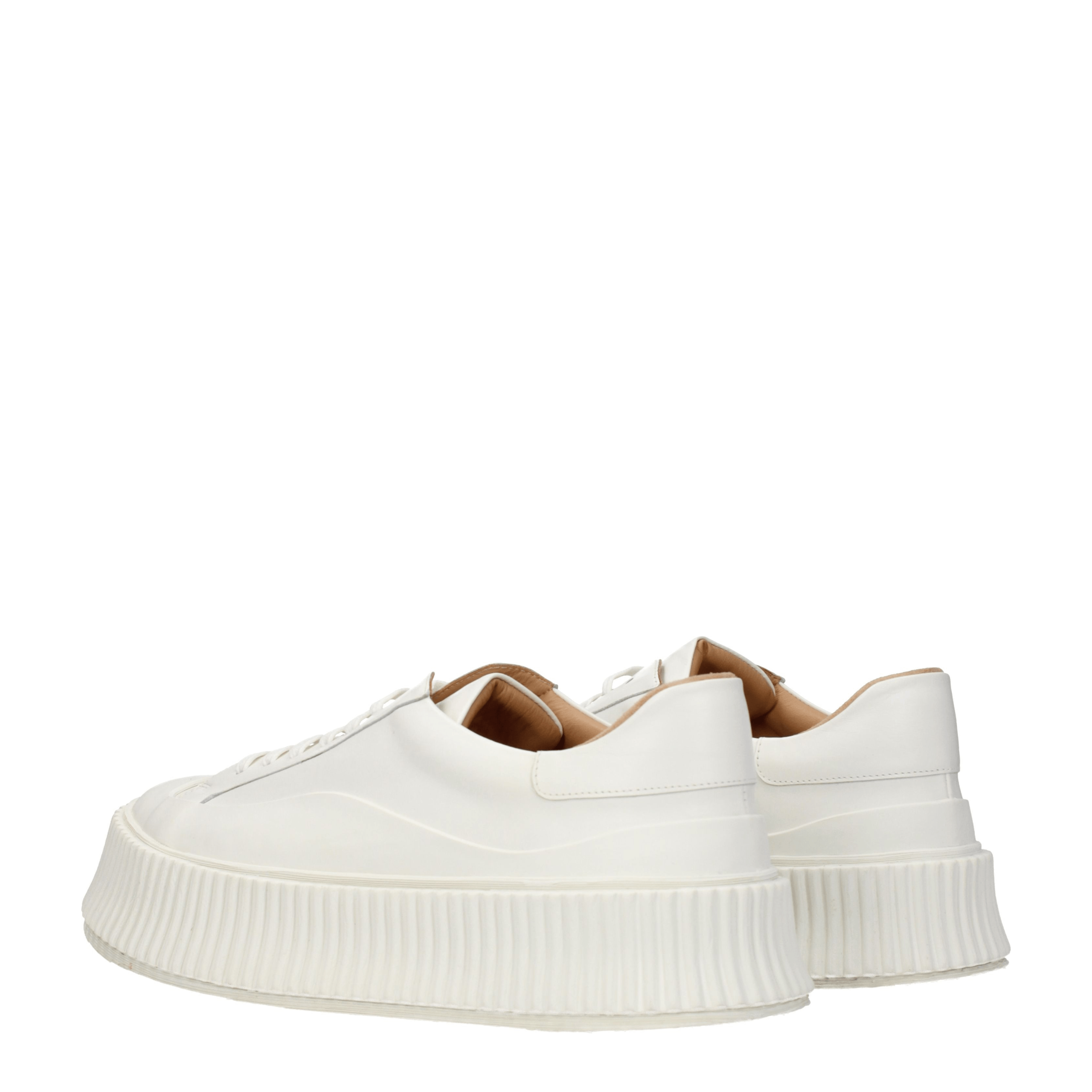 Elevate your style with Jil Sander's White Leather Platform Sneakers, a stunning blend of luxury and sophistication, designed for the discerning fashion connoisseur.