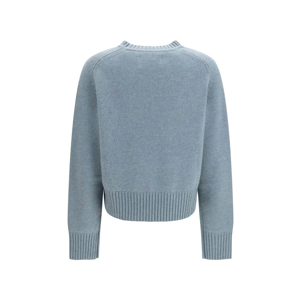 Indulge in the exquisite allure of the Extreme Cashmere Blue Cashmere Sweatshirt, a masterpiece of pure cashmere that embodies refined elegance and modern sophistication.