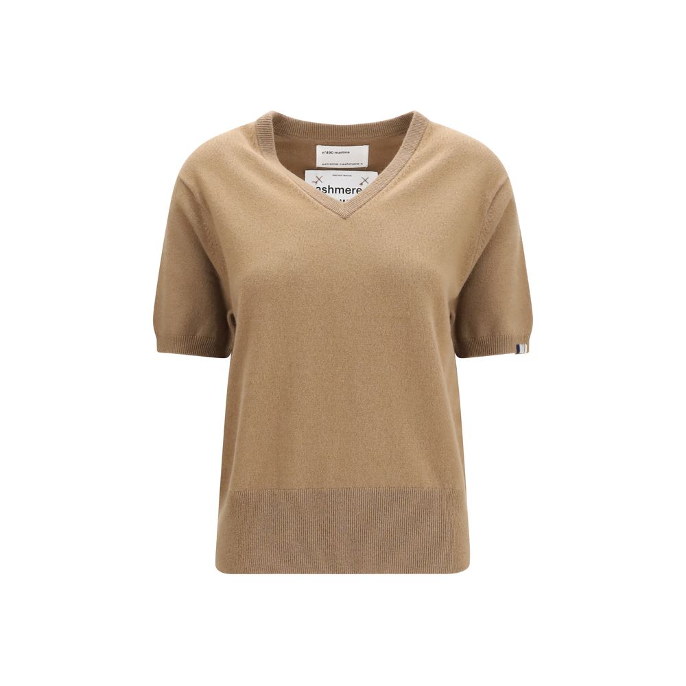 Indulge in the exquisite N°490 Martina cashmere blend sweater by Extreme Cashmere, a timeless piece that embodies refined luxury and effortless elegance for every season.