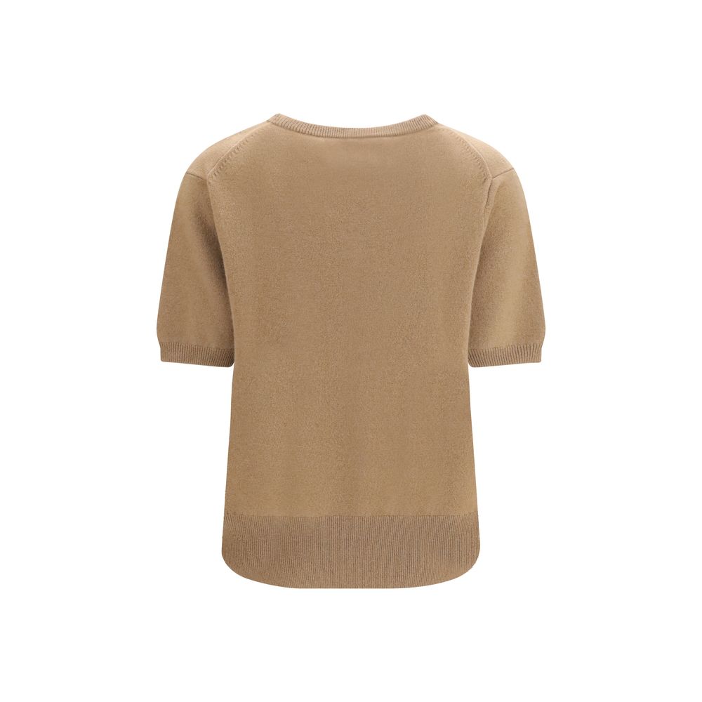 Indulge in the N°490 Martina cashmere blend Sweater by Extreme Cashmere, a masterpiece of minimalist design and luxurious comfort, perfect for every season.