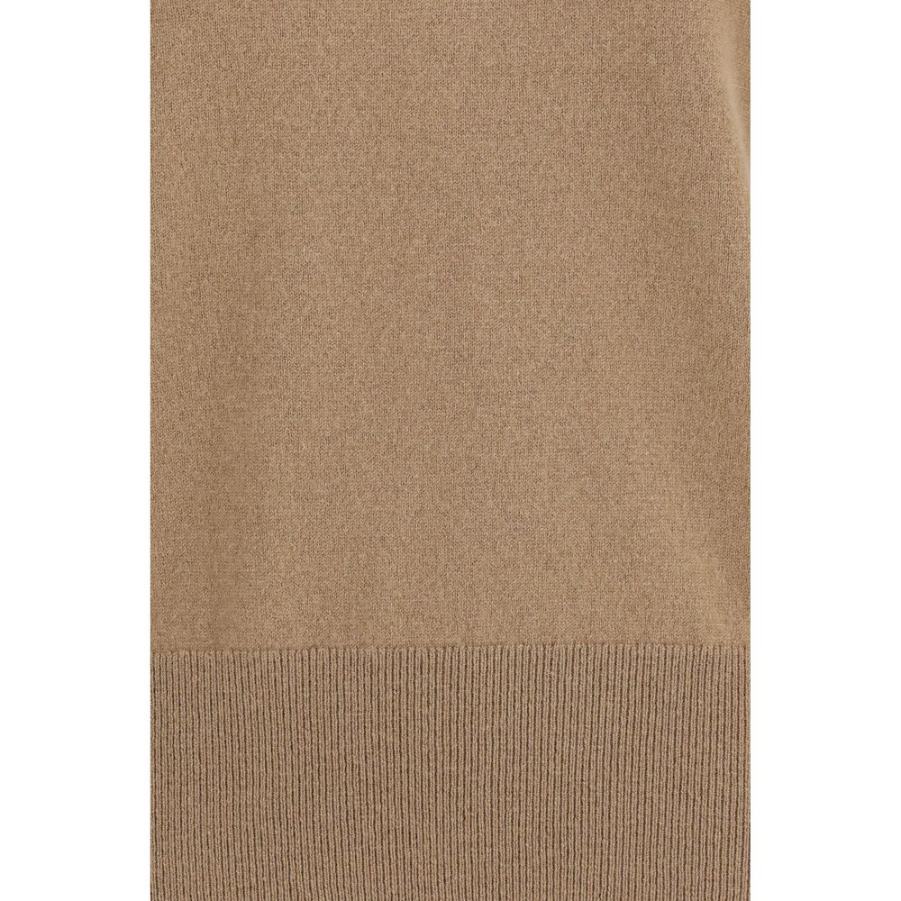 Indulge in the N°490 Martina cashmere blend sweater by Extreme Cashmere, a timeless piece crafted from luxurious materials that embodies sophistication and versatility for every season.