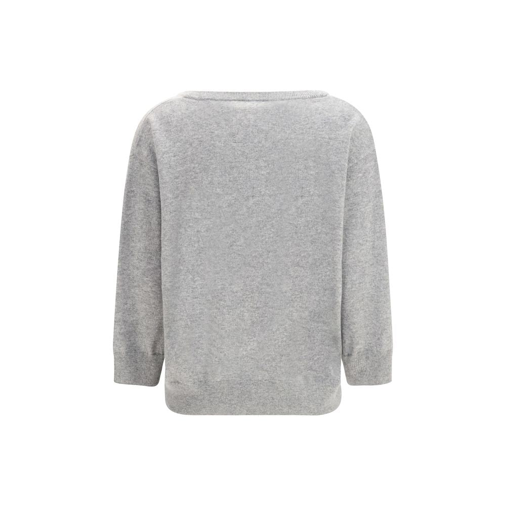 Indulge in the exquisite N°491 V-neck cashmere sweater by Extreme Cashmere, a timeless piece crafted from luxurious open-knit cashmere, perfect for elevated style.