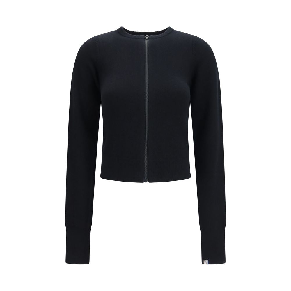 Indulge in the exquisite allure of the Extreme Cashmere Black Cashmere Cardigan, a luxurious layer crafted from soft cashmere, perfect for refined everyday elegance.