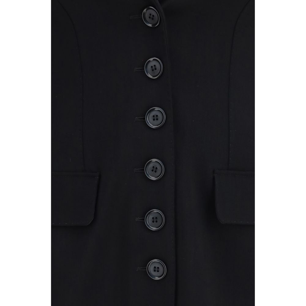 Indulge in the exquisite Dolce & Gabbana Black Wool Oves Aries Full-Length Jacket, a masterpiece of tailored elegance crafted from premium stretch wool for a refined silhouette.