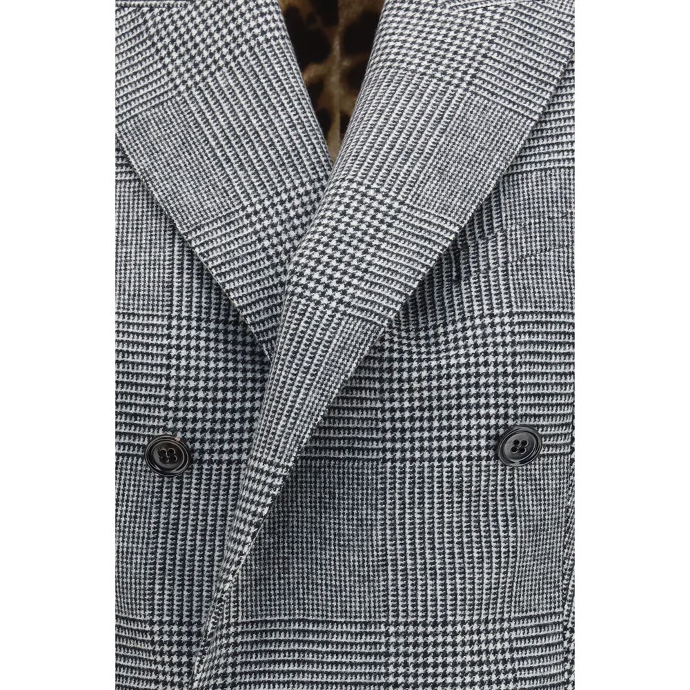 Elevate your wardrobe with the Dolce & Gabbana Gray Wool Oves Aries Waistcoat, a masterpiece of tailored elegance and sophisticated design, perfect for the discerning individual.