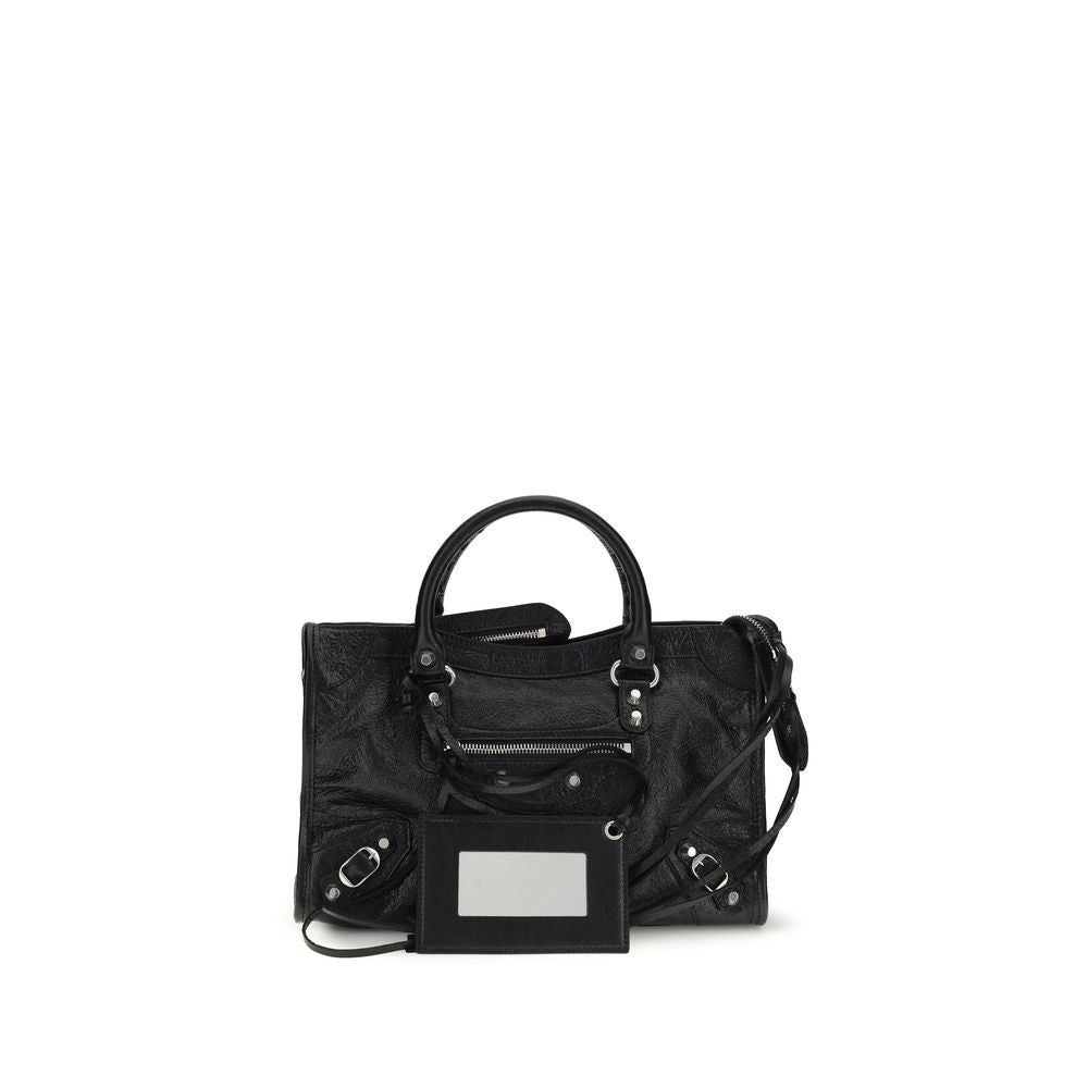 Indulge in the exquisite allure of the Balenciaga Black Lamb Ovis Aries Aries Shoulder Bag, a symbol of contemporary luxury crafted from sumptuous black Arena lambskin, perfect for the discerning individual.