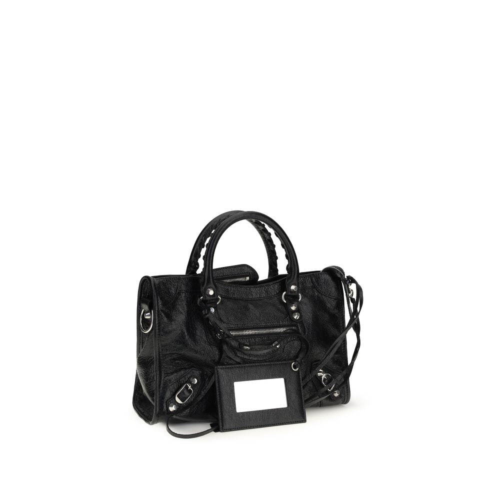 Elevate your style with the Balenciaga Black Lamb Ovis Aries Aries Shoulder Bag, a masterpiece of contemporary design and exquisite craftsmanship, perfect for the discerning individual.