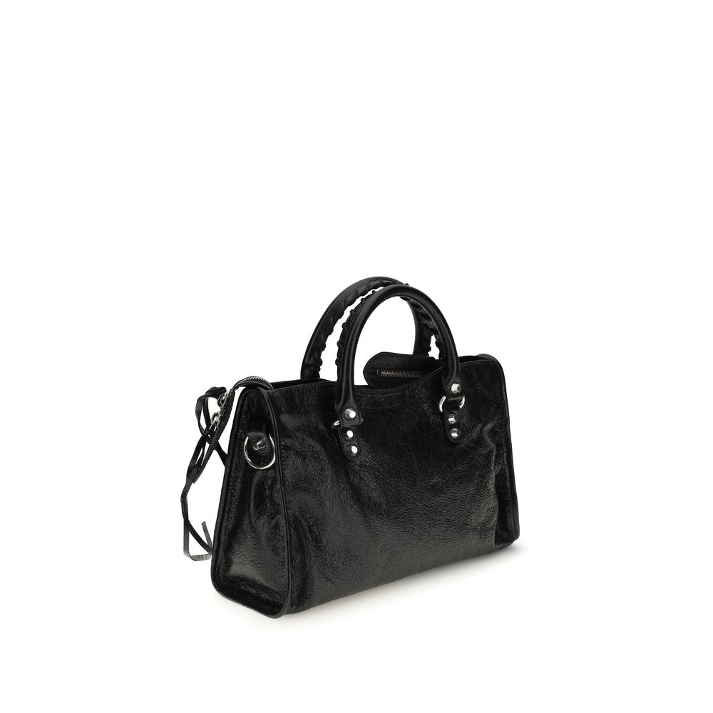 Indulge in the exquisite allure of the Balenciaga Black Lamb Ovis Aries Aries Shoulder Bag, a masterpiece of craftsmanship and contemporary design, perfect for the discerning individual.
