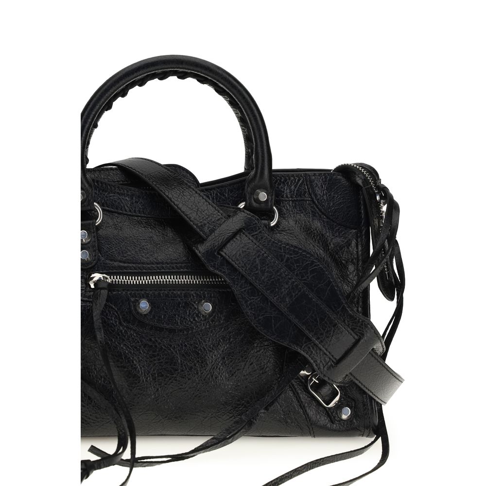 Indulge in the exquisite allure of the Balenciaga Black Lamb Ovis Aries Aries Shoulder Bag, a masterpiece of craftsmanship and contemporary elegance, perfect for the discerning connoisseur.