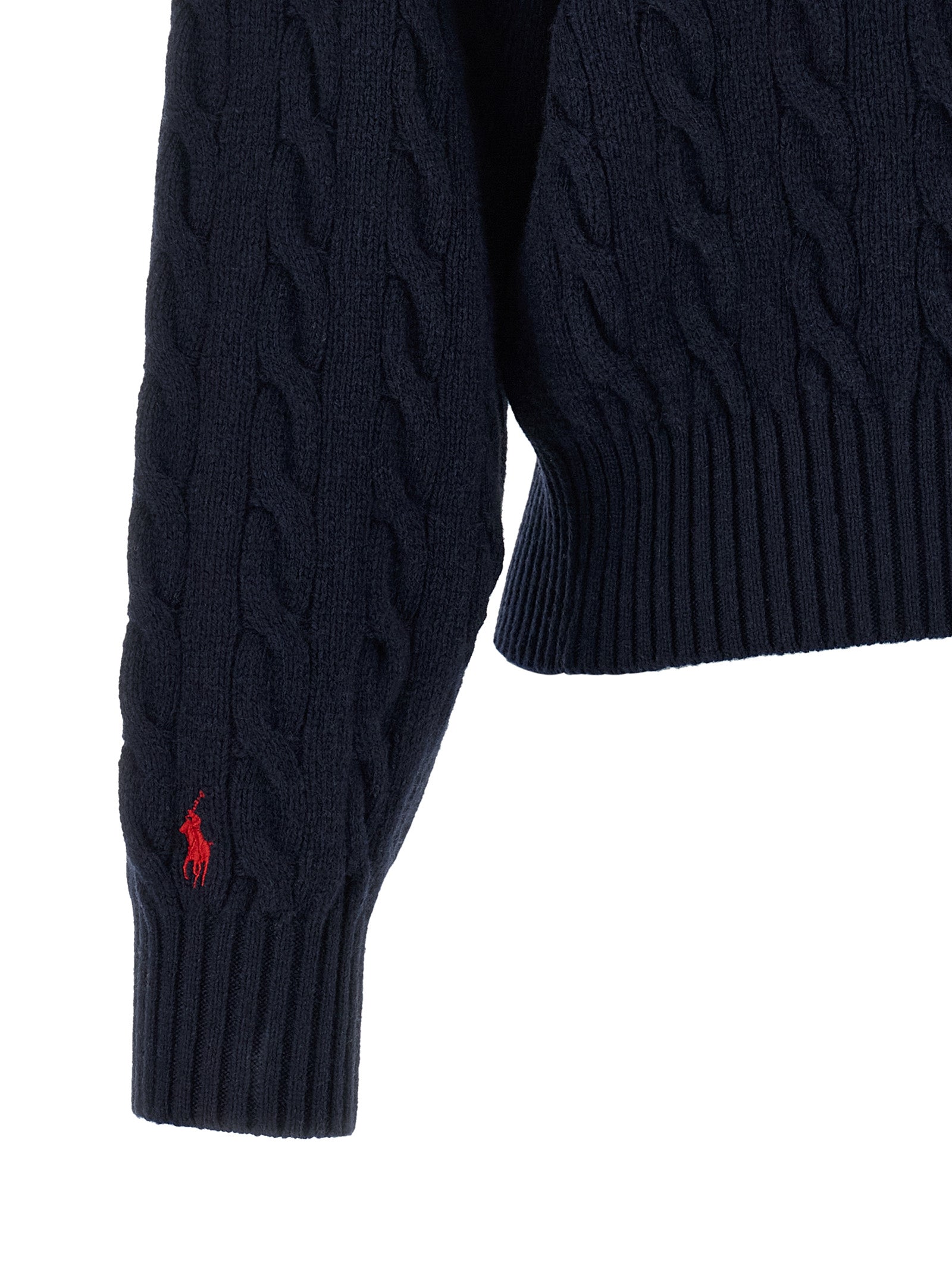 Elevate your wardrobe with the Polo Ralph Lauren Blue Wool Cardigan, a masterpiece of Italian craftsmanship, blending luxurious wool and cashmere for timeless sophistication.