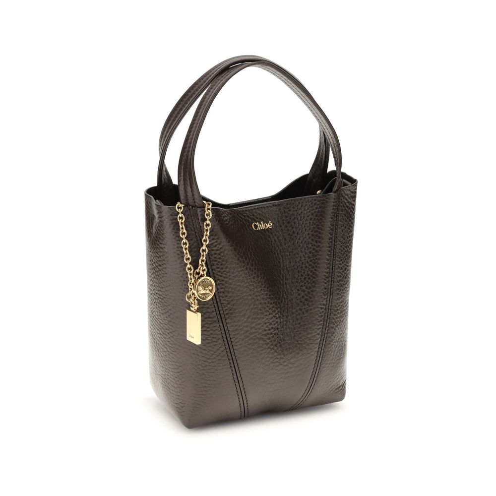 Indulge in the exquisite Chloé Brown Calf Leather Bos Taurus Shoulder Bag, a masterpiece of craftsmanship and elegance, perfect for the discerning fashion connoisseur.