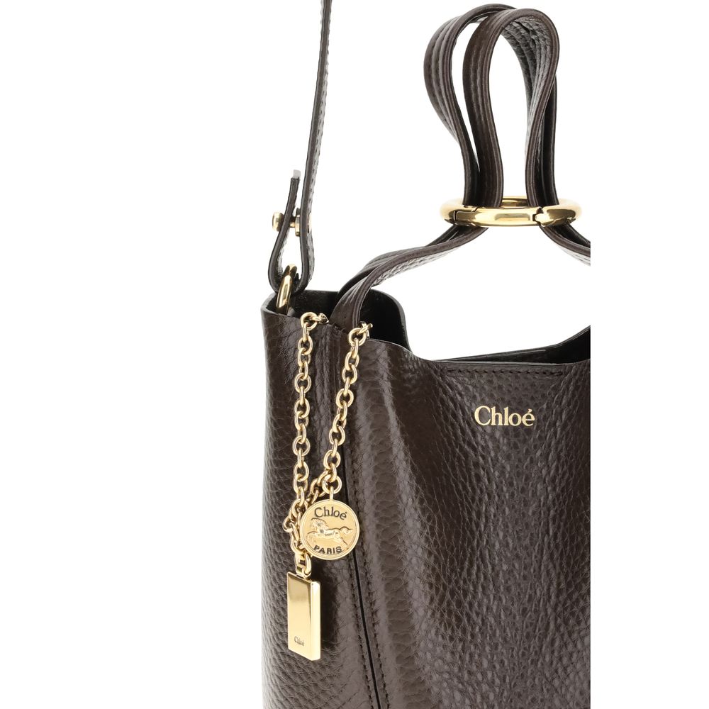 Discover the Chloé Brown Calf Leather Bos Taurus Shoulder Bag, a masterpiece of exquisite craftsmanship and timeless elegance, perfect for the discerning connoisseur.