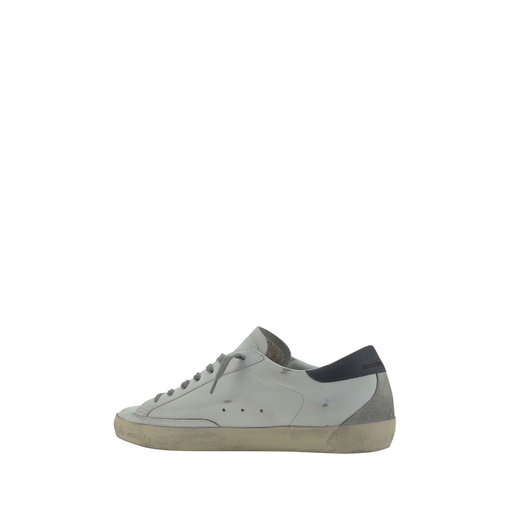 Elevate your style with Golden Goose White Goatskin Low Top Sneakers, a masterclass in luxury craftsmanship, featuring exquisite goatskin and iconic design elements for the discerning individual.
