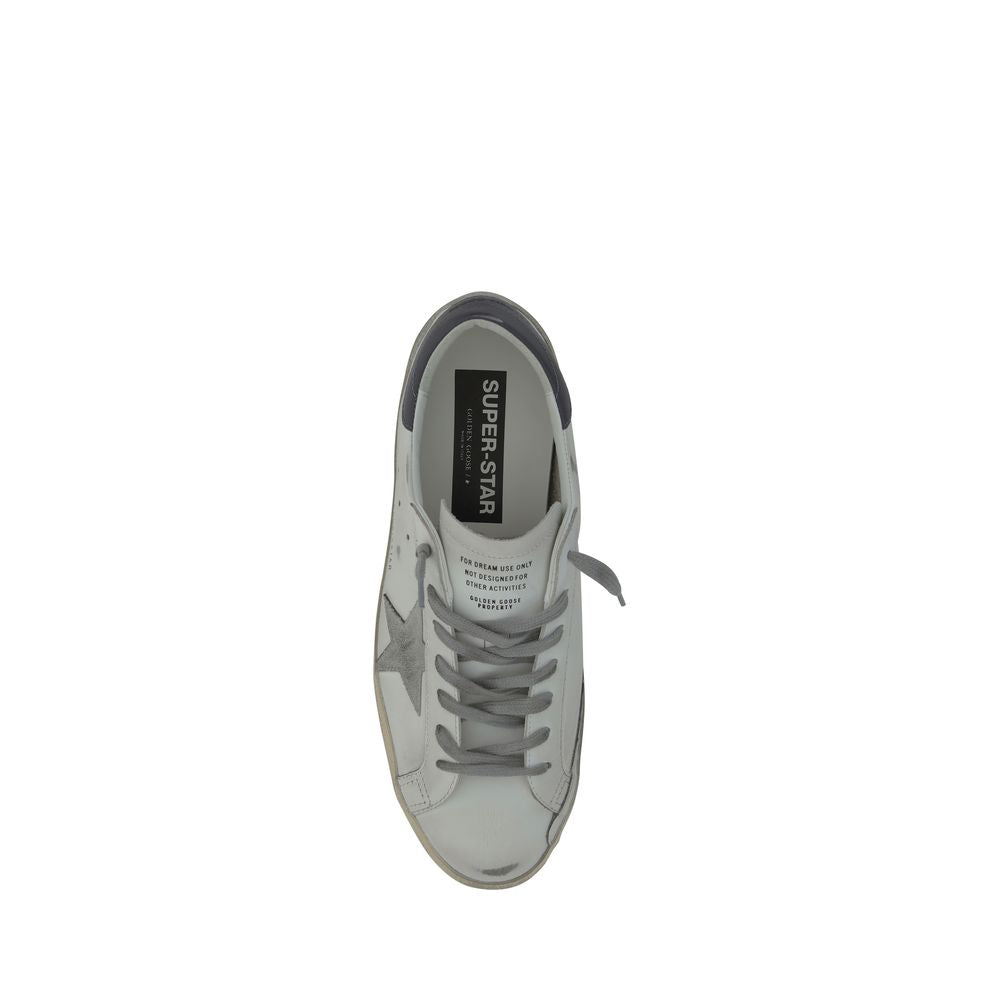 Indulge in the exquisite craftsmanship of Golden Goose White Goatskin Low Top Sneakers, where luxury meets iconic design for a timeless statement in style.