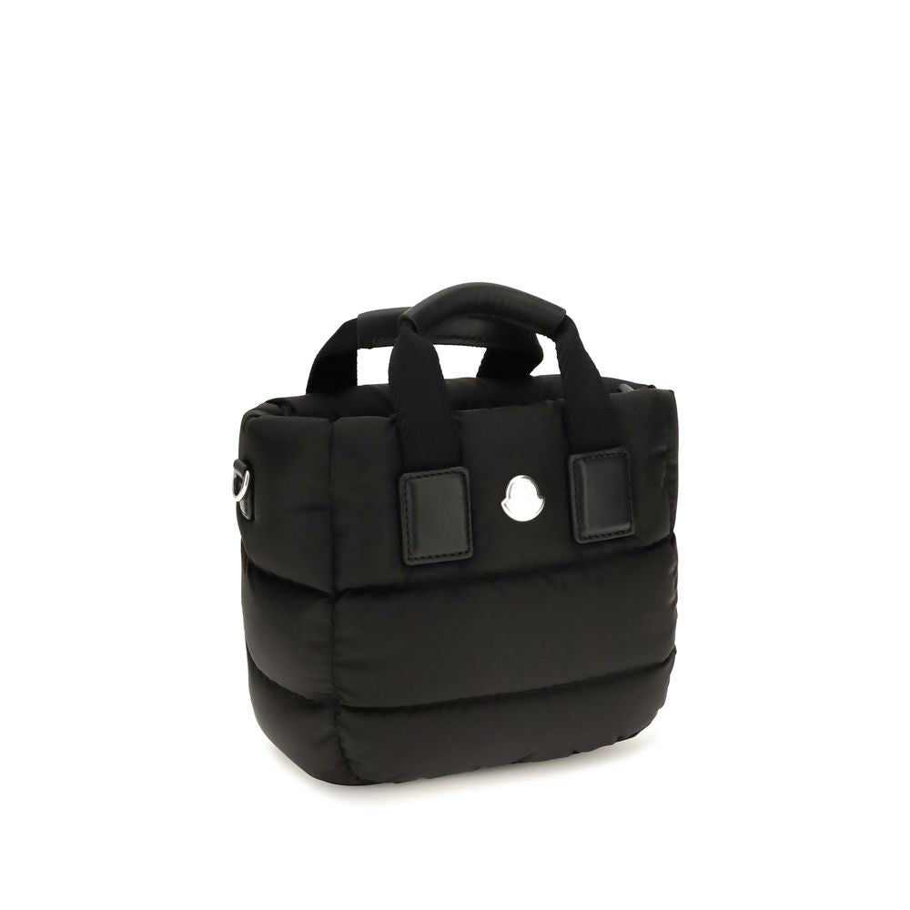 Indulge in the Moncler Black Nylon Shoulder Bag, a masterpiece of quilted elegance, blending luxury and practicality for the discerning individual.
