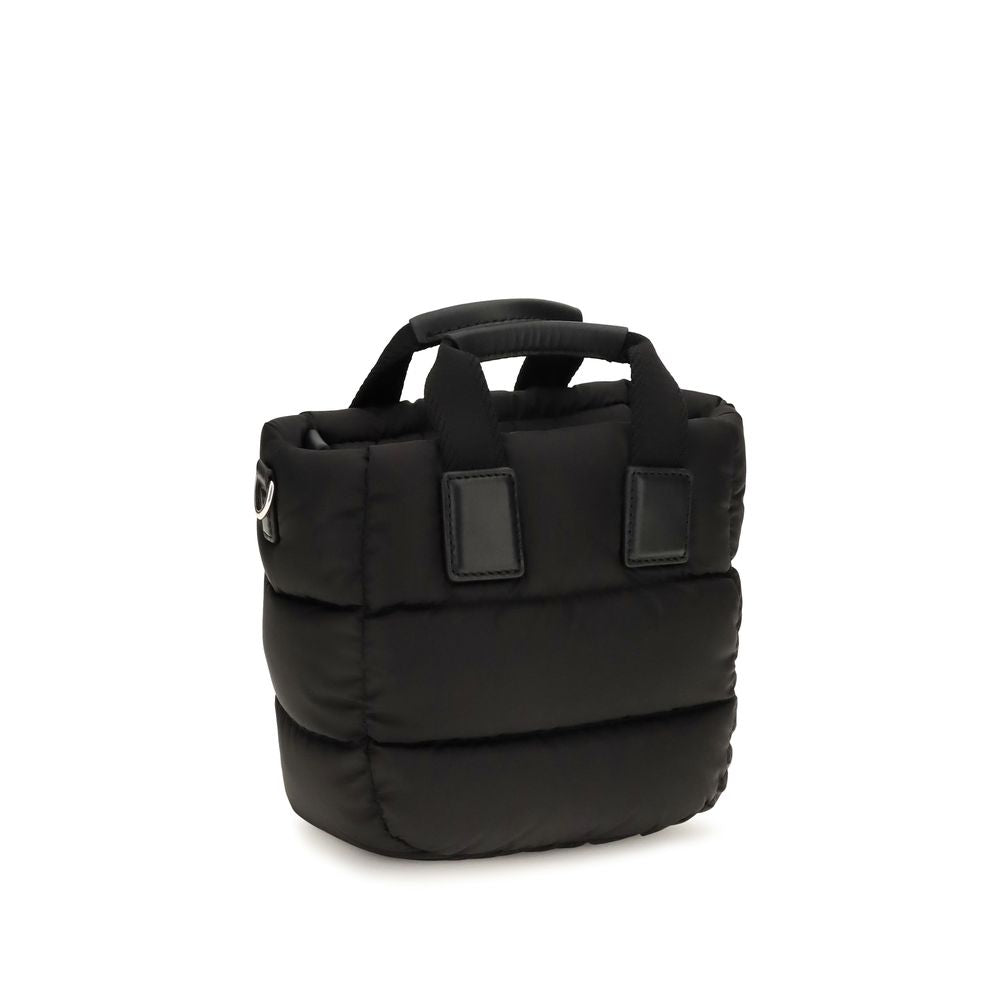 Discover the Moncler Black Nylon Shoulder Bag, a fusion of iconic design and luxurious craftsmanship, perfect for those who embrace elegance and sophistication.
