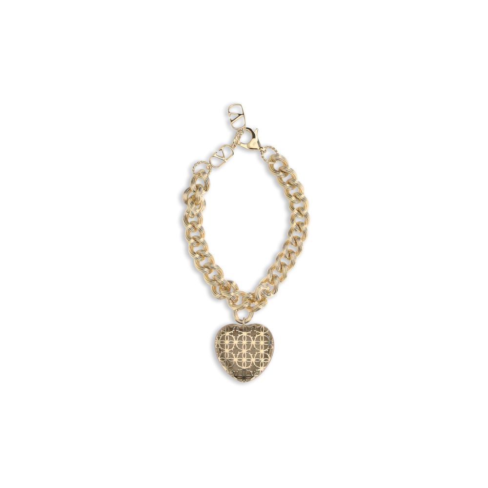 Discover the Coeur Royal chain Bracelet by Valentino Garavani, a gold-plated masterpiece adorned with a heart charm, embodying refined elegance and romantic allure.