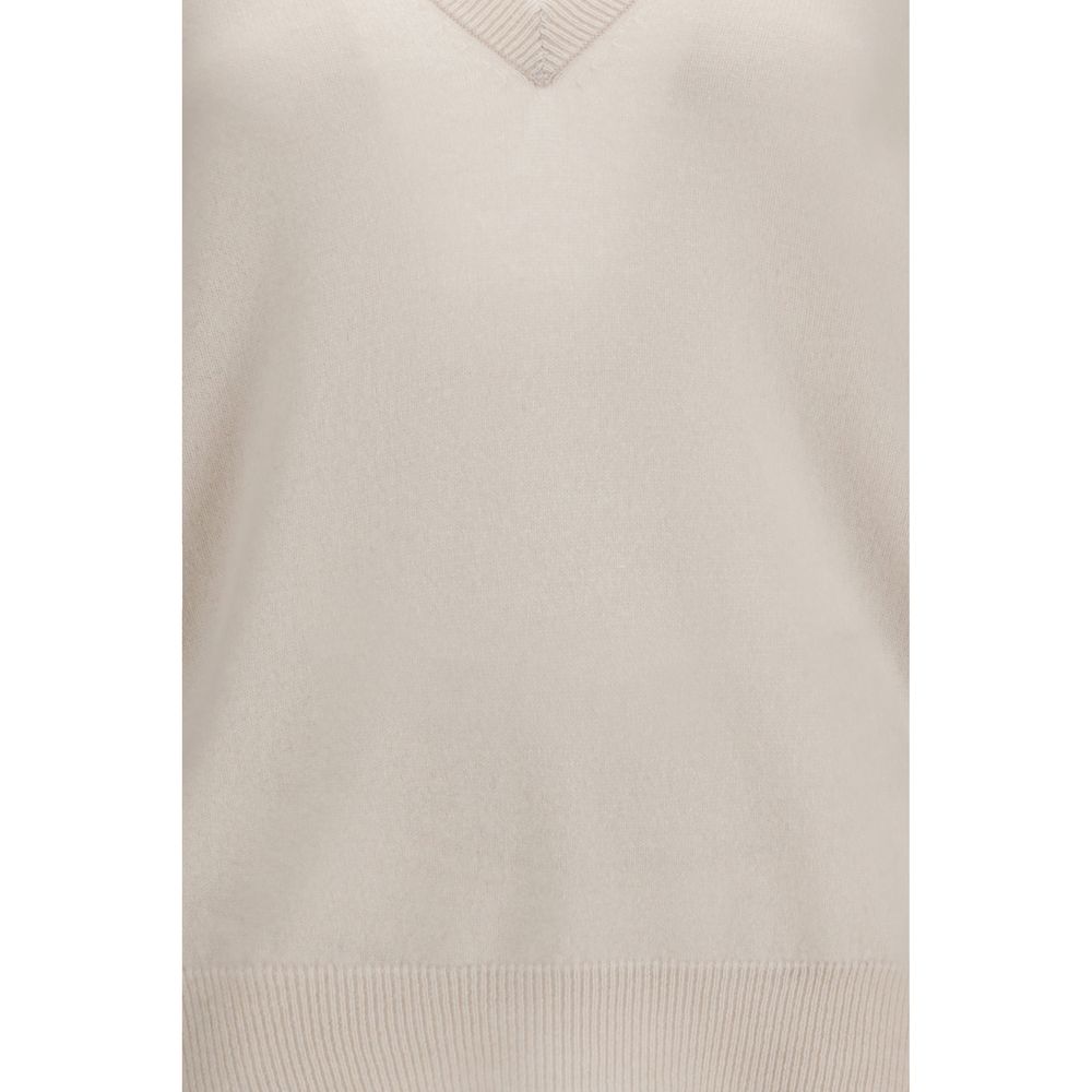 Indulge in the exquisite N°492 Ben cashmere Sweater by Extreme Cashmere, a timeless piece crafted from pure cashmere, embodying minimalist elegance for discerning tastes.