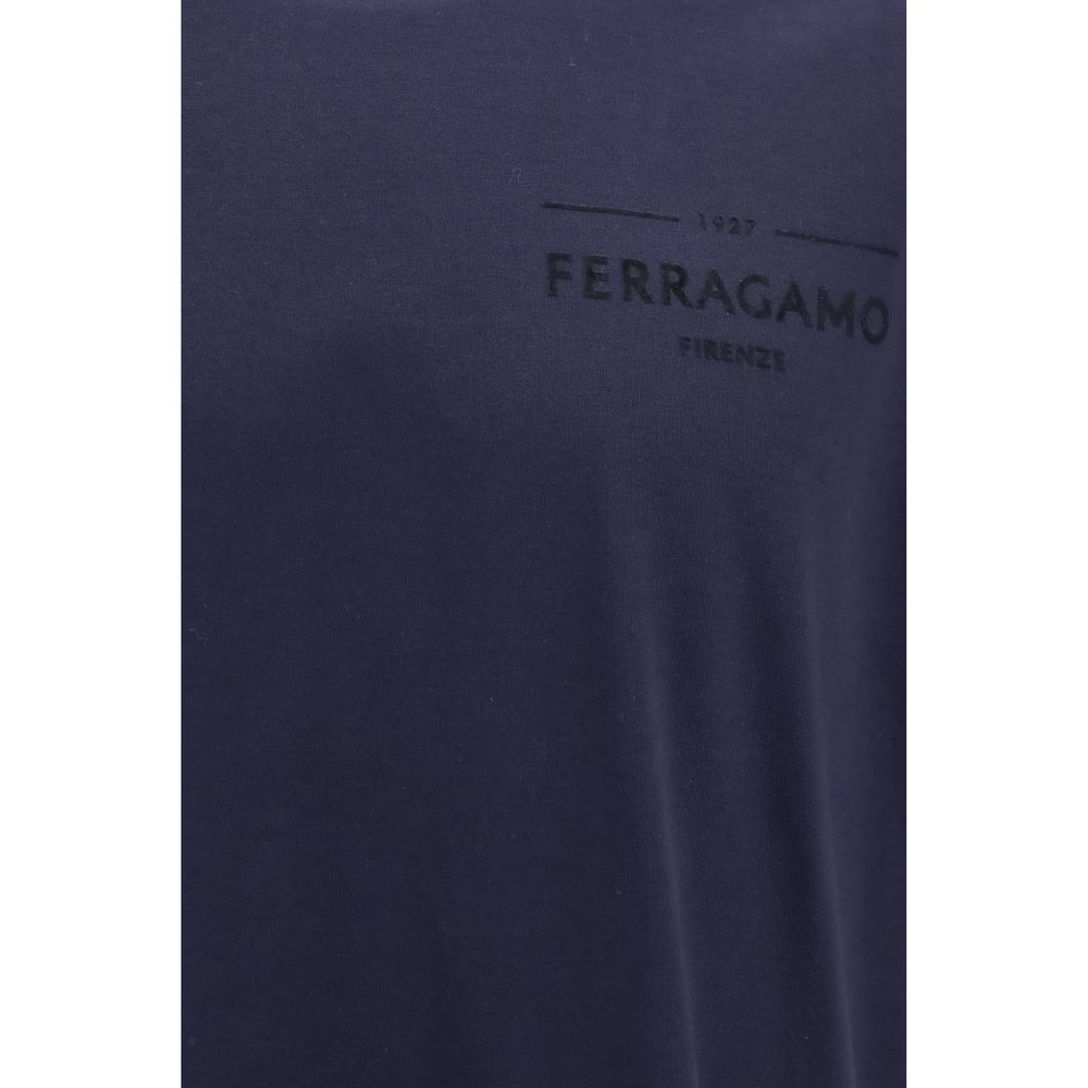 Indulge in the luxurious Ferragamo Blue Cotton T-Shirt, crafted from organic cotton for an essential silhouette that embodies sophistication and comfort.