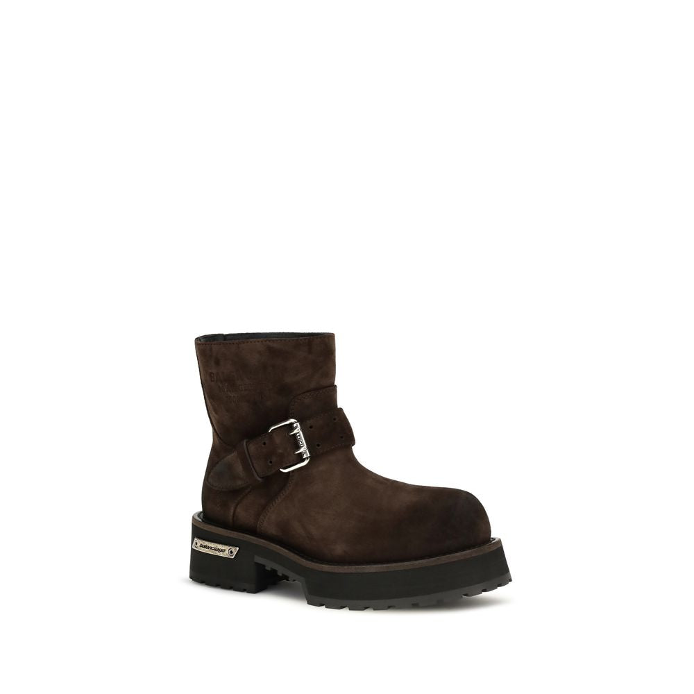 Indulge in the exquisite Balenciaga Brown Calf Leather Bos Taurus Ankle Boots, where bold design meets luxurious craftsmanship, perfect for the discerning fashion connoisseur.