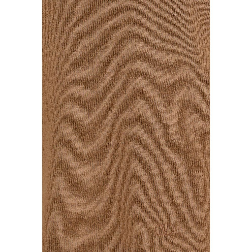Indulge in the refined elegance of the Valentino Garavani Brown Wool Oves Aries Sweatshirt, crafted from 100% Fleece Wool for a luxurious fit that embodies sophistication and comfort.